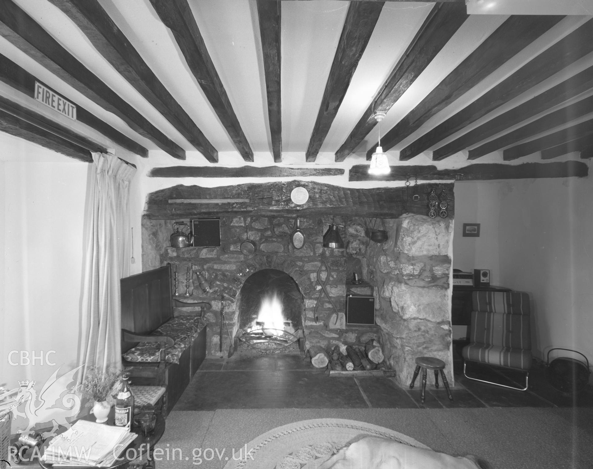 Digital copy of an acetate negative showing ceiling beams and fireplace at Hywel Ddu, Merioneth.