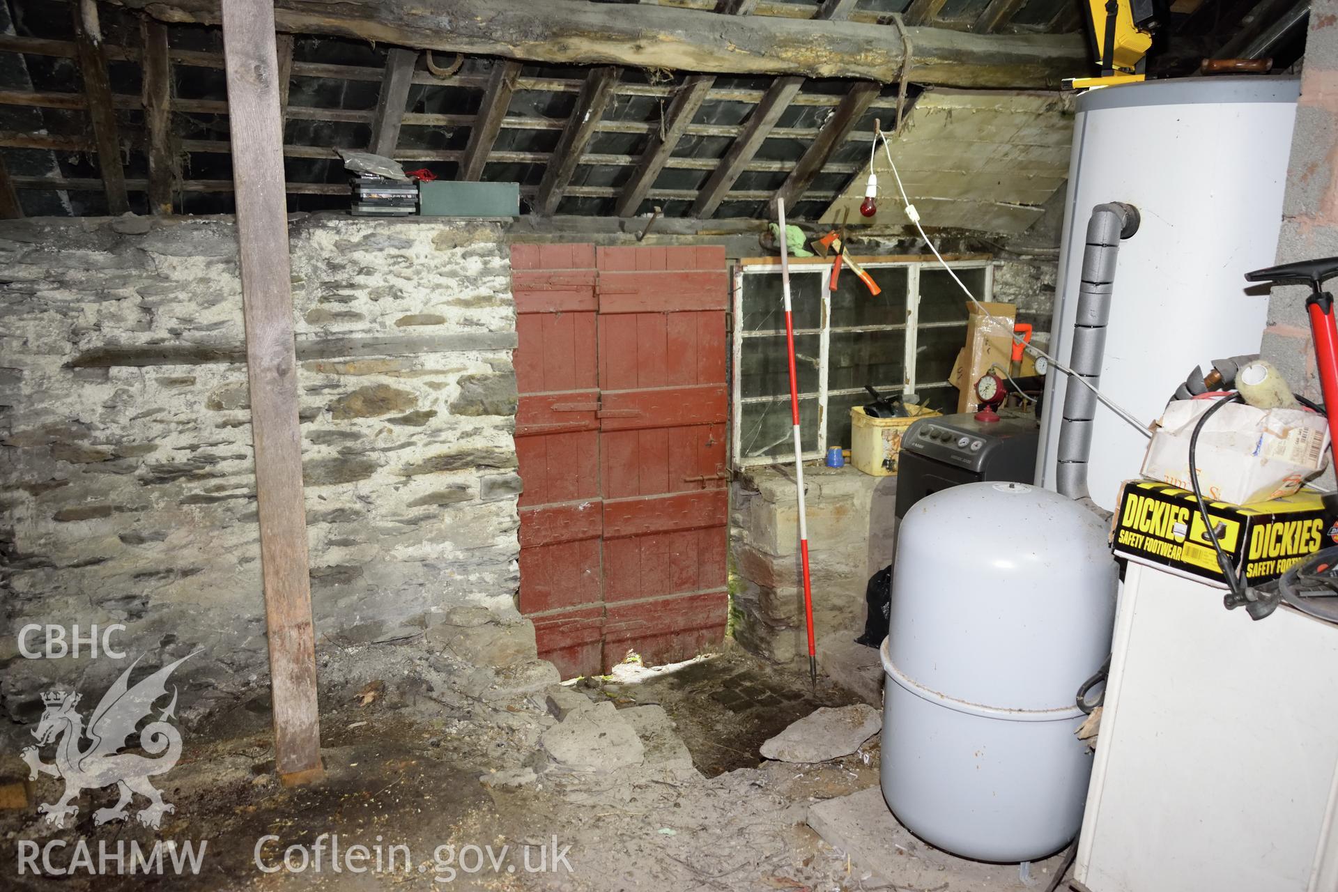 Photograph of the front door and window taken from inside the forge at Glascoed or Islwyn Smithy, Melin-y-Wig, Denbighshire, by I.P. Brooks of Engineering Archaeological Services Ltd. Taken on 5th April 2019.