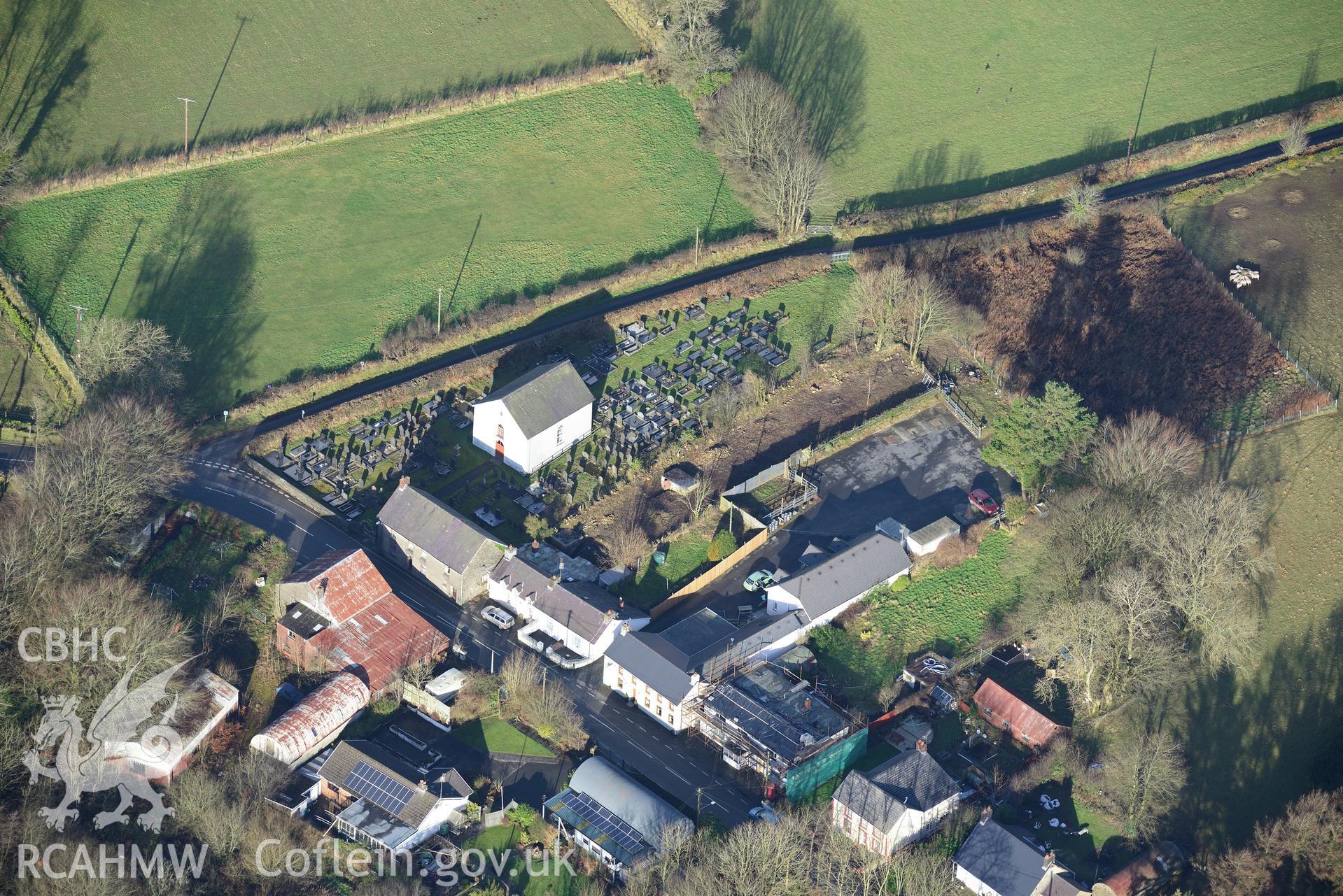 Cribyn village and Welsh Unitarian Chapel. Oblique aerial photograph taken during the Royal Commission's programme of archaeological aerial reconnaissance by Toby Driver on 6th January 2015.