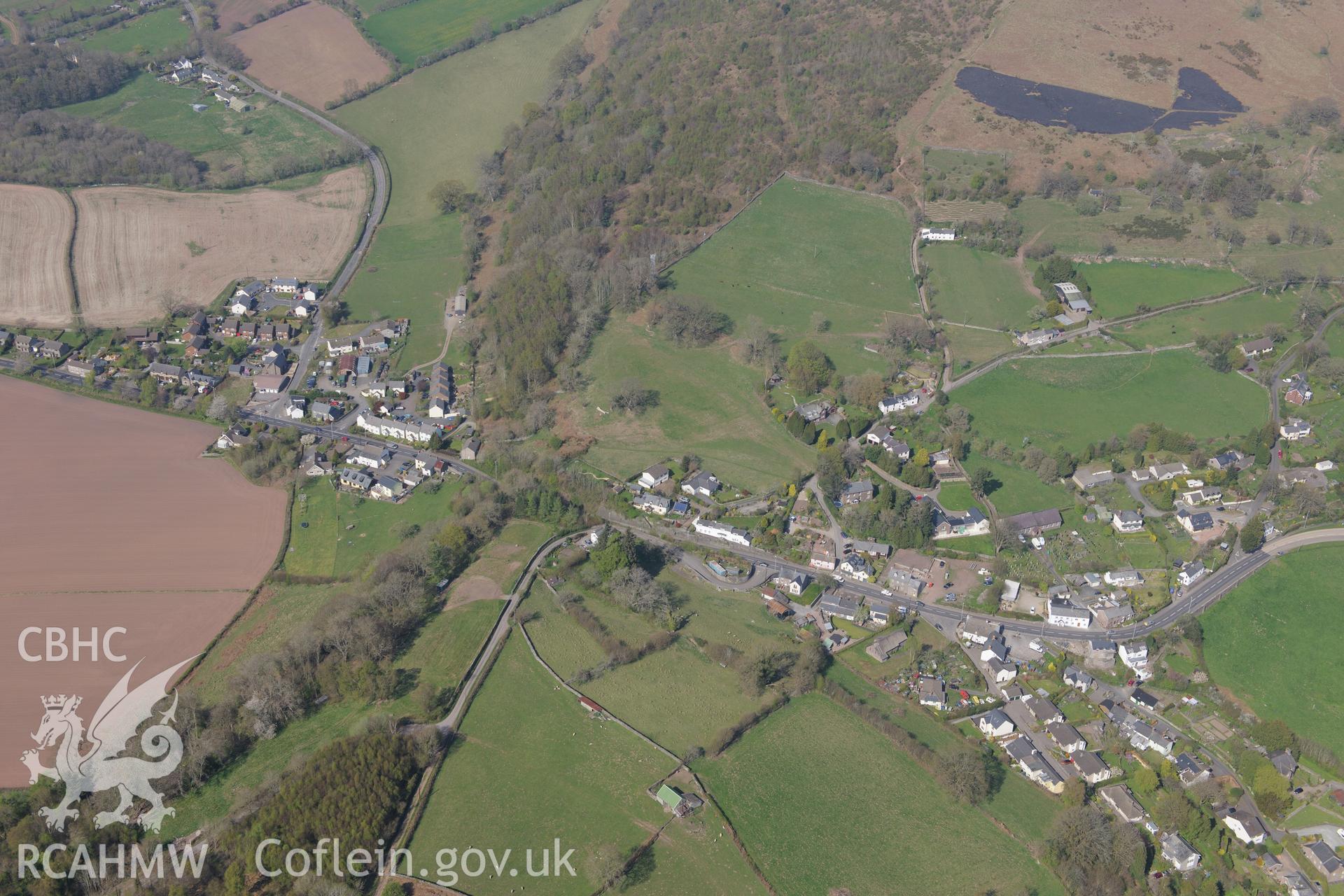 Bwlch including views of All Saint's Church, Penuel Chapel and defensive enclosure. Oblique aerial photograph taken during the Royal Commission's programme of archaeological aerial reconnaissance by Toby Driver on 21st April 2015.