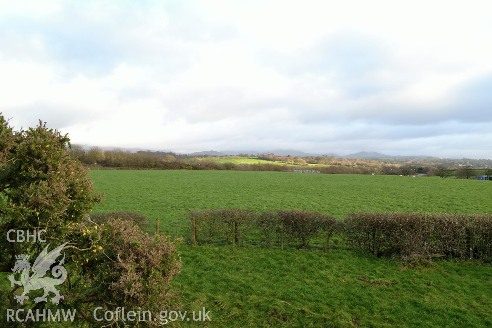 View from north edge of Tomen Fawr toward A497, photographed by Gwynedd Archaeological Trust during impact assessment of the site on 20th December 2018. Project no. G2564.