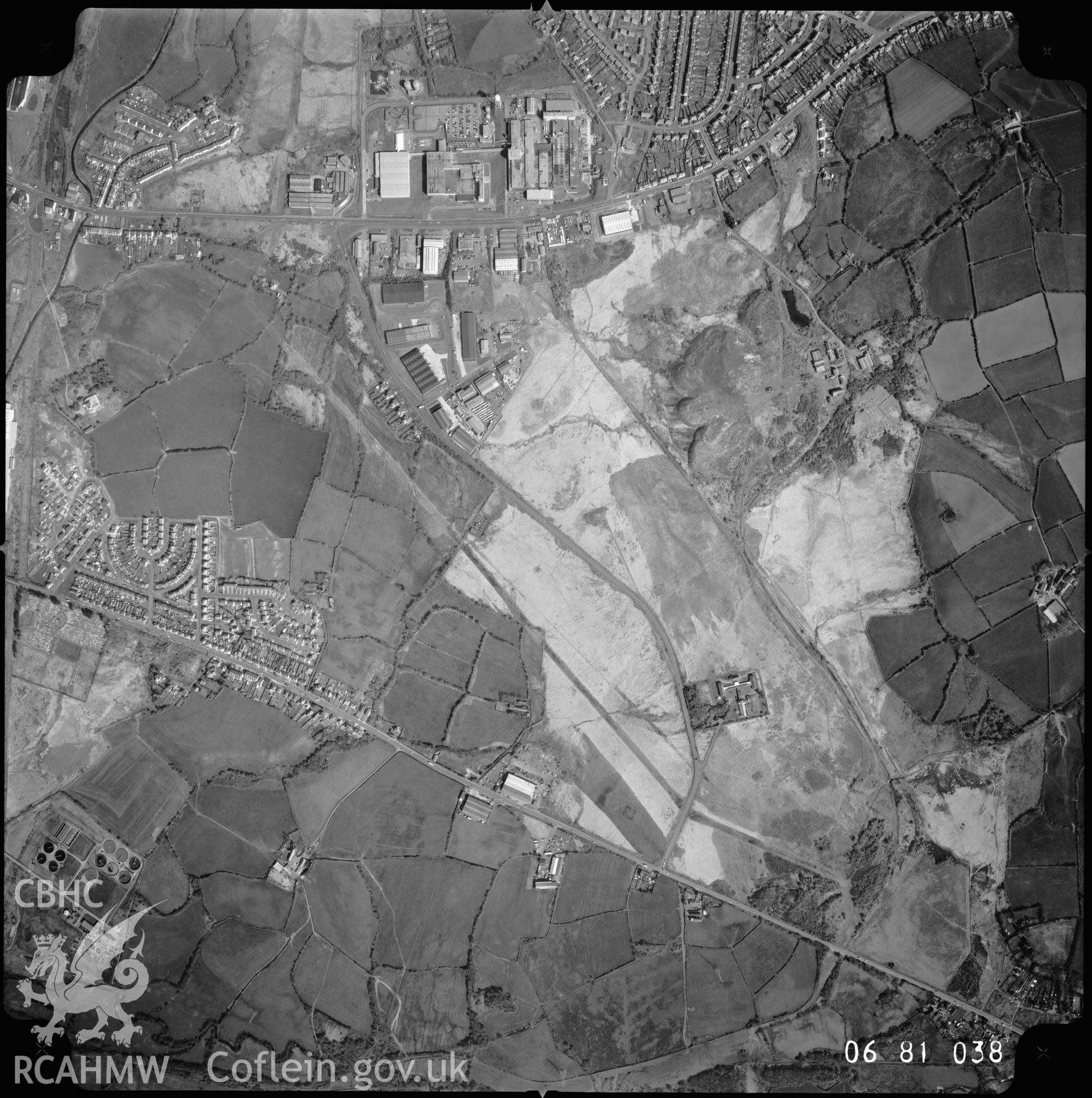 Black and white aerial photograph taken in April 1981. Part of material used in a Setting Impact Assessment of Land off Phoenix Way, Garngoch Business Village, Swansea, carried out by Archaeology Wales, 2018. Project number P2631.