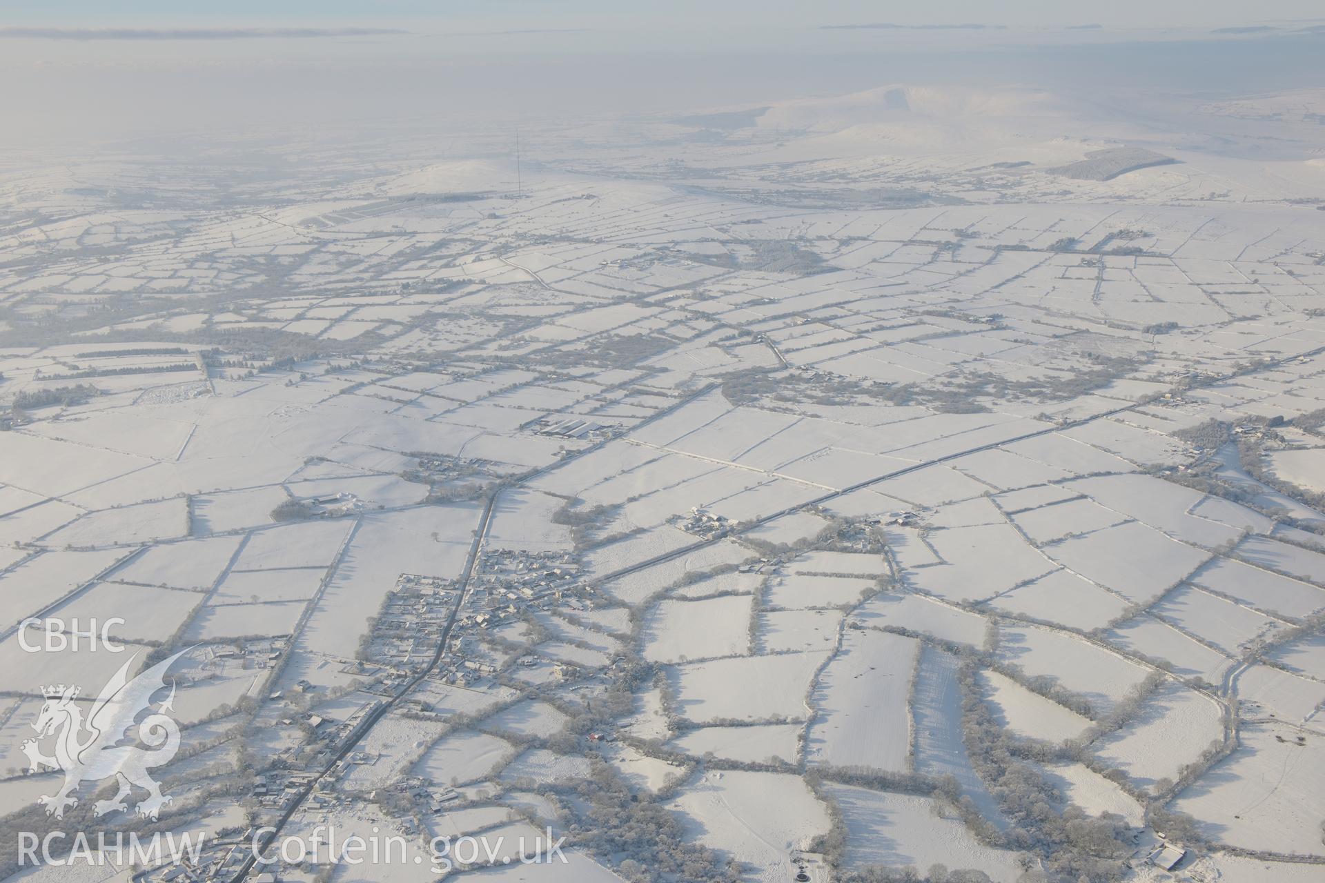 Hermon village, south east of Crymych. Oblique aerial photograph taken during the Royal Commission?s programme of archaeological aerial reconnaissance by Toby Driver on 24th January 2013.