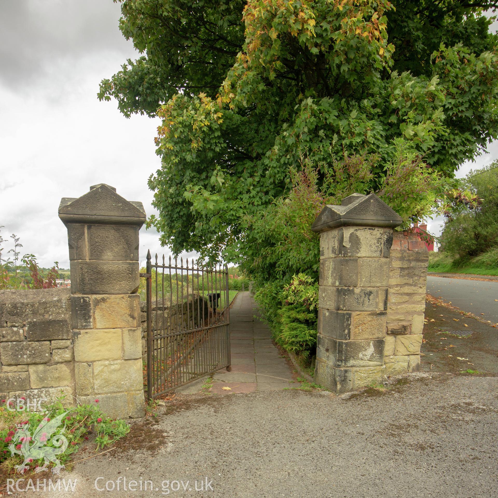 Colour photograph showing gated entrance leading to Seion a'r Tabernacl Welsh Baptist Chapel, Cefn-mawr. Photographed by Richard Barrett on 15th September 2018.