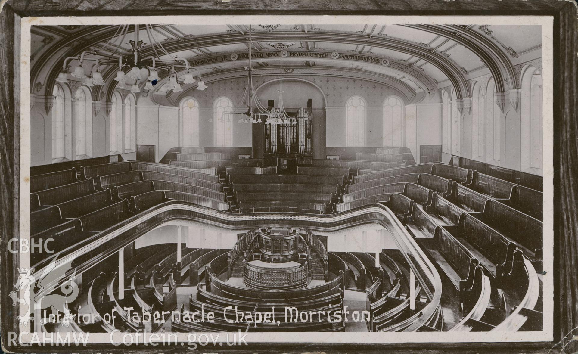 Digital copy of monochrome postcard showing view from rear 1st floor seating towards organ & pulpit at Tabernacle Welsh Independent chapel, Morriston. Produced by Rhys Roberts, Bookseller, Stationer & Printer, Morriston. Loaned for copying by Thomas Lloyd.