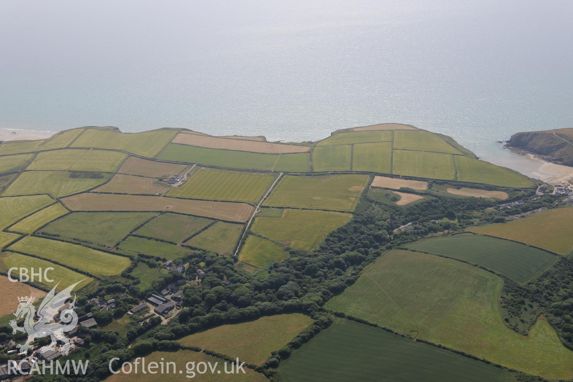 Nolton Haven Village. Oblique aerial photograph taken during the Royal Commission?s programme of archaeological aerial reconnaissance by Toby Driver on 16th July 2013.