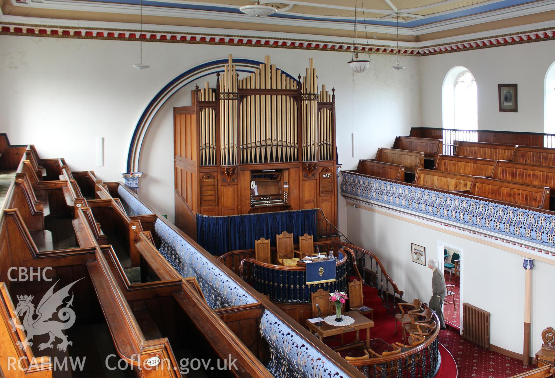 Interior view from first floor balcony showing the pulpit and organ. Photographic survey of Seion Welsh Baptist Chapel, Morriston, conducted by Sue Fielding on 13th May 2017.