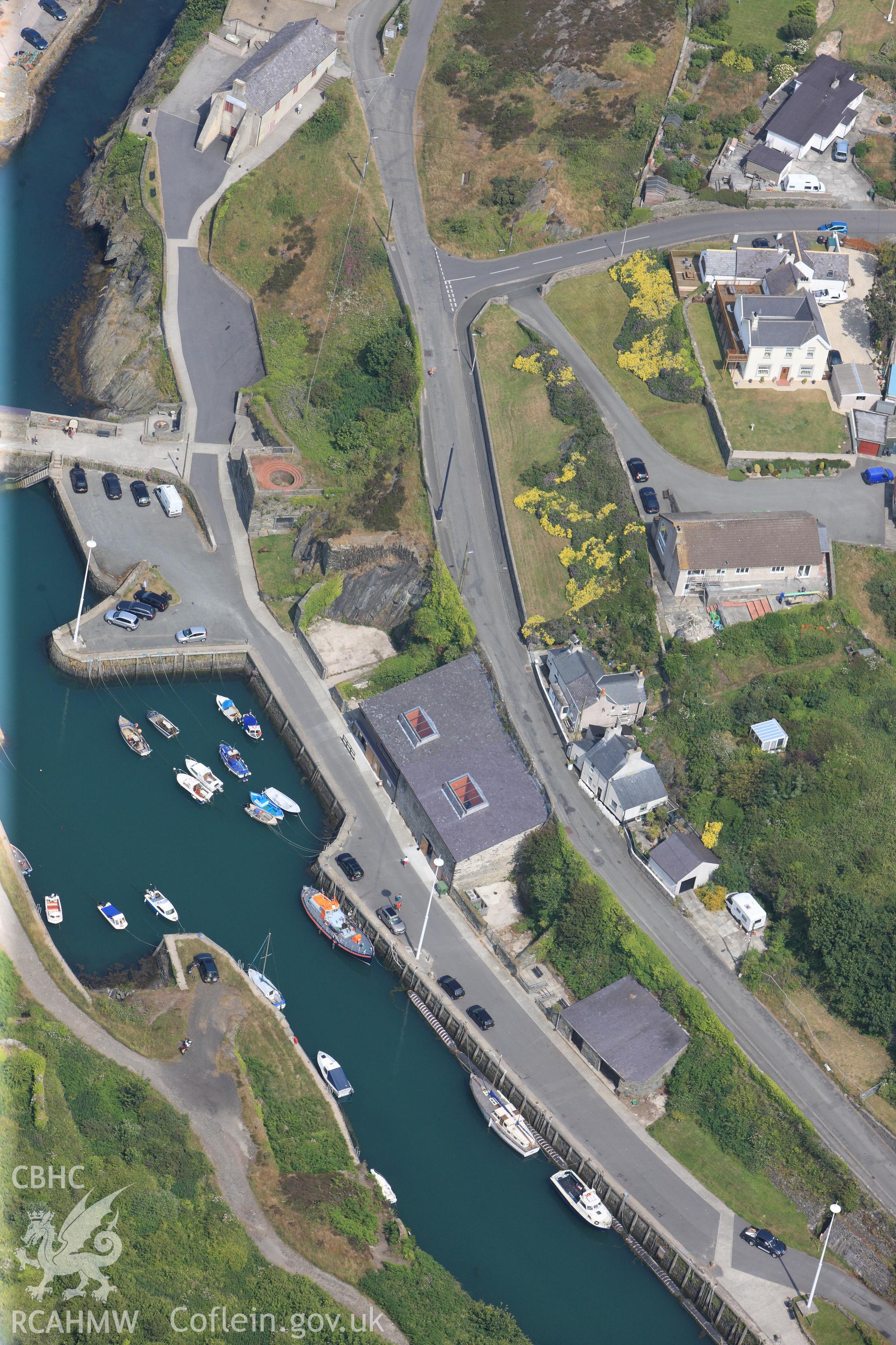 Amlwch harbour, Anglesey. Oblique aerial photograph taken during the Royal Commission?s programme of archaeological aerial reconnaissance by Toby Driver on 12th July 2013.