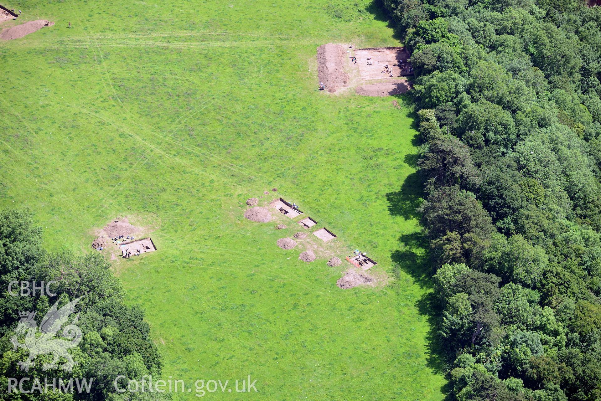 Excavation of Caerau Hillfort, Ely, conducted by Cardiff University. Oblique aerial photograph taken during the Royal Commission's programme of archaeological aerial reconnaissance by Toby Driver on 29th June 2015.