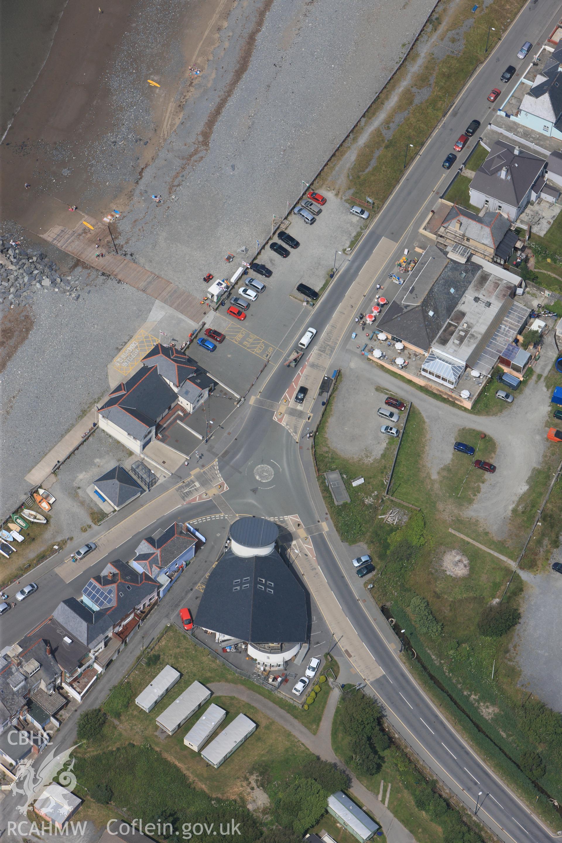 Borth village. Oblique aerial photograph taken during the Royal Commission?s programme of archaeological aerial reconnaissance by Toby Driver on 12th July 2013.