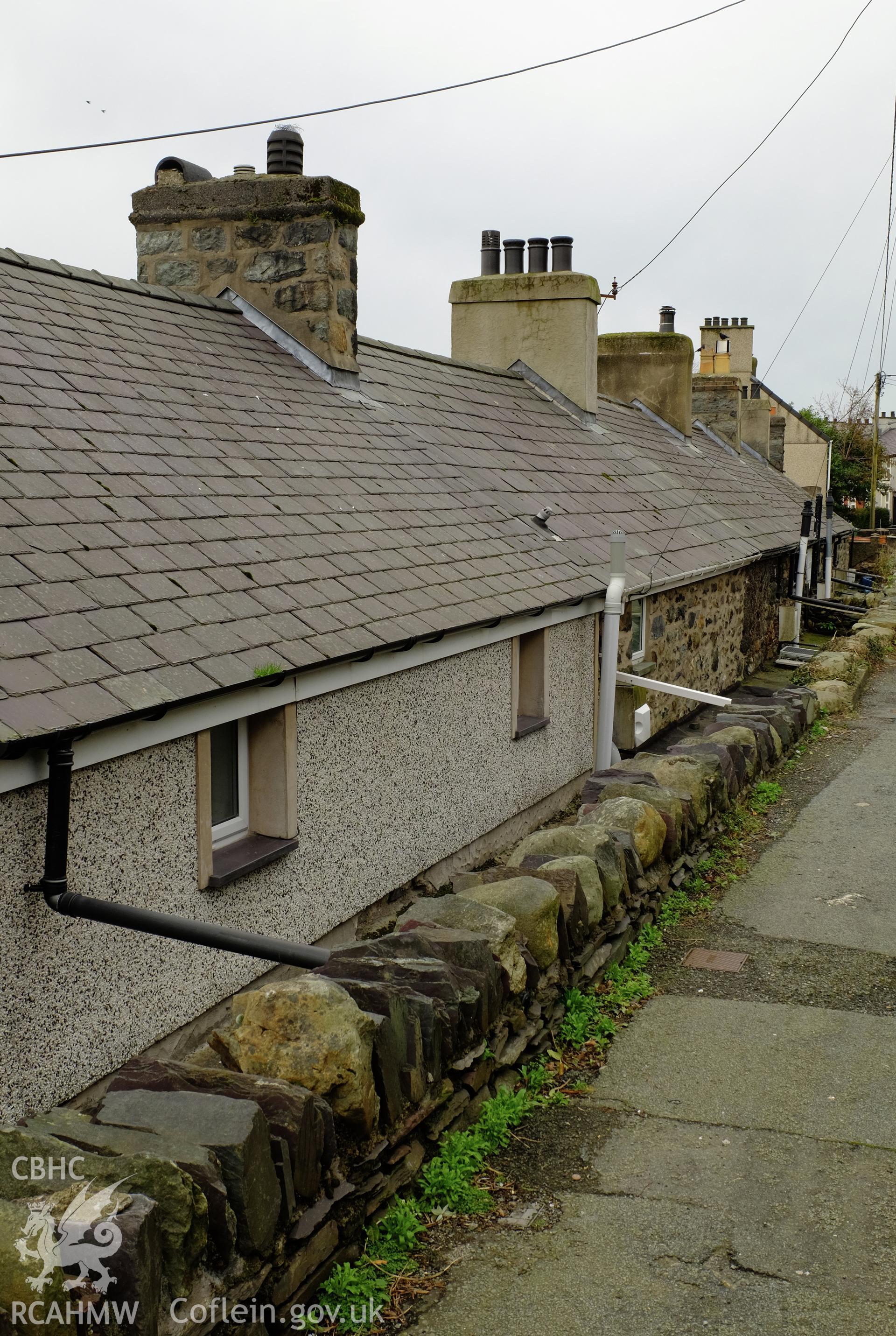 Colour photograph showing view looking south west at rear of houses at Penbryn Terrace, Bethesda, produced by Richard Hayman 2nd March 2017