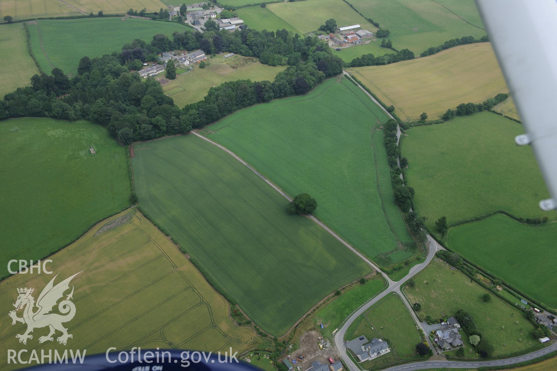 Womastone house and garden, south west of Presteigne, on the Welsh-English border. Oblique aerial photograph taken during the Royal Commission?s programme of archaeological aerial reconnaissance by Toby Driver on 1st August 2013.