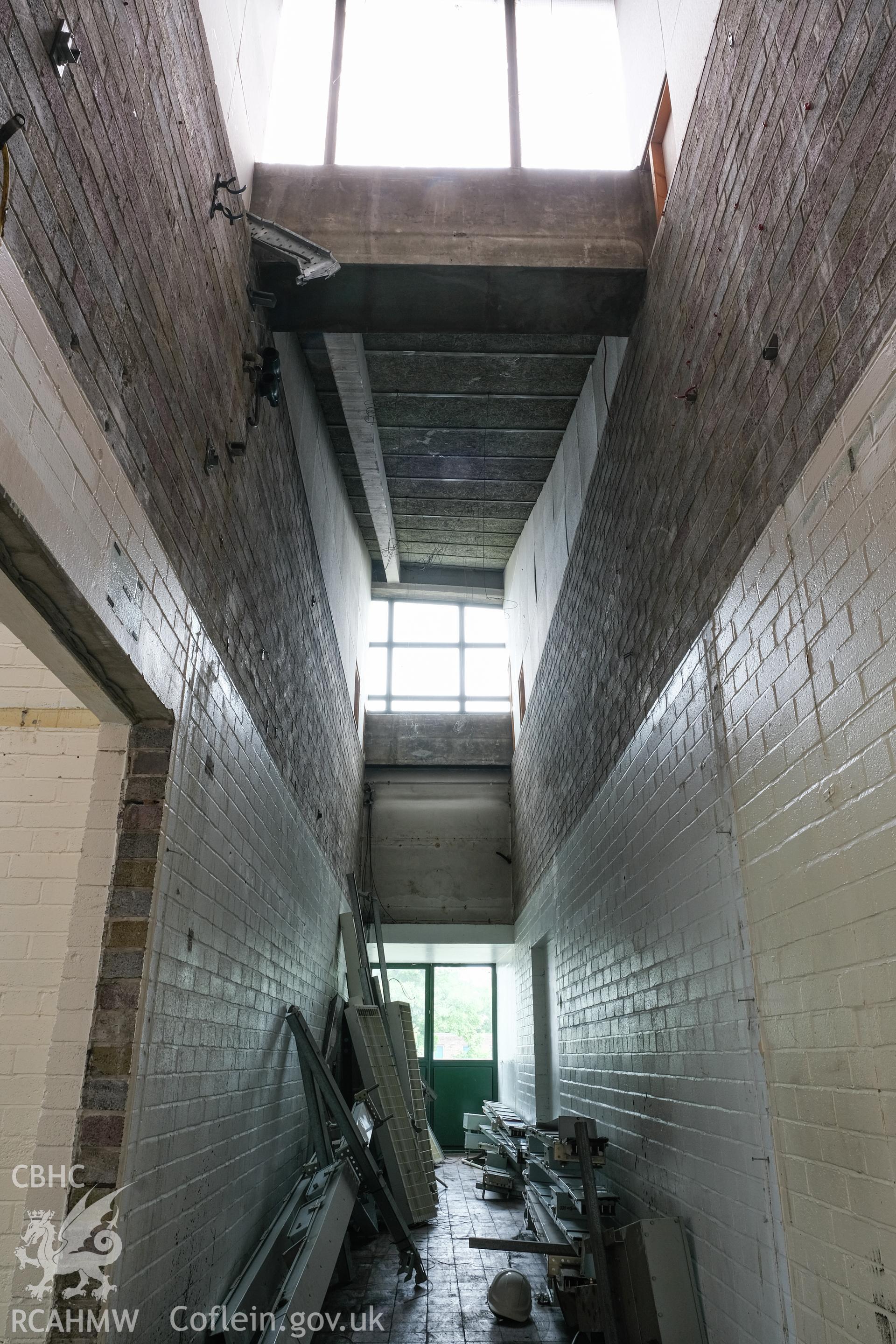 Digital colour photograph showing interior view of corridor at Caernarfonshire Technical College, Ffriddoedd Road, Bangor. Photographed by Dilys Morgan and donated by Wyn Thomas of Grwp Llandrillo-Menai Further Education College, 2019.