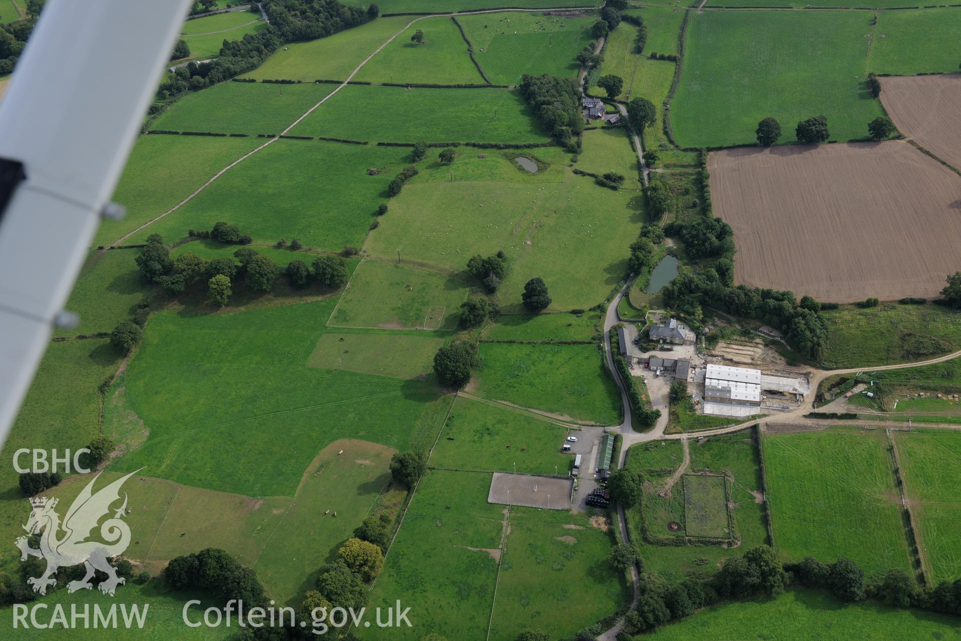 Part of the section of Wat's Dyke running from Chester-Holywell Road to Soughton Farm. Oblique aerial photograph taken during the Royal Commission's programme of archaeological aerial reconnaissance by Toby Driver on 11th September 2015.