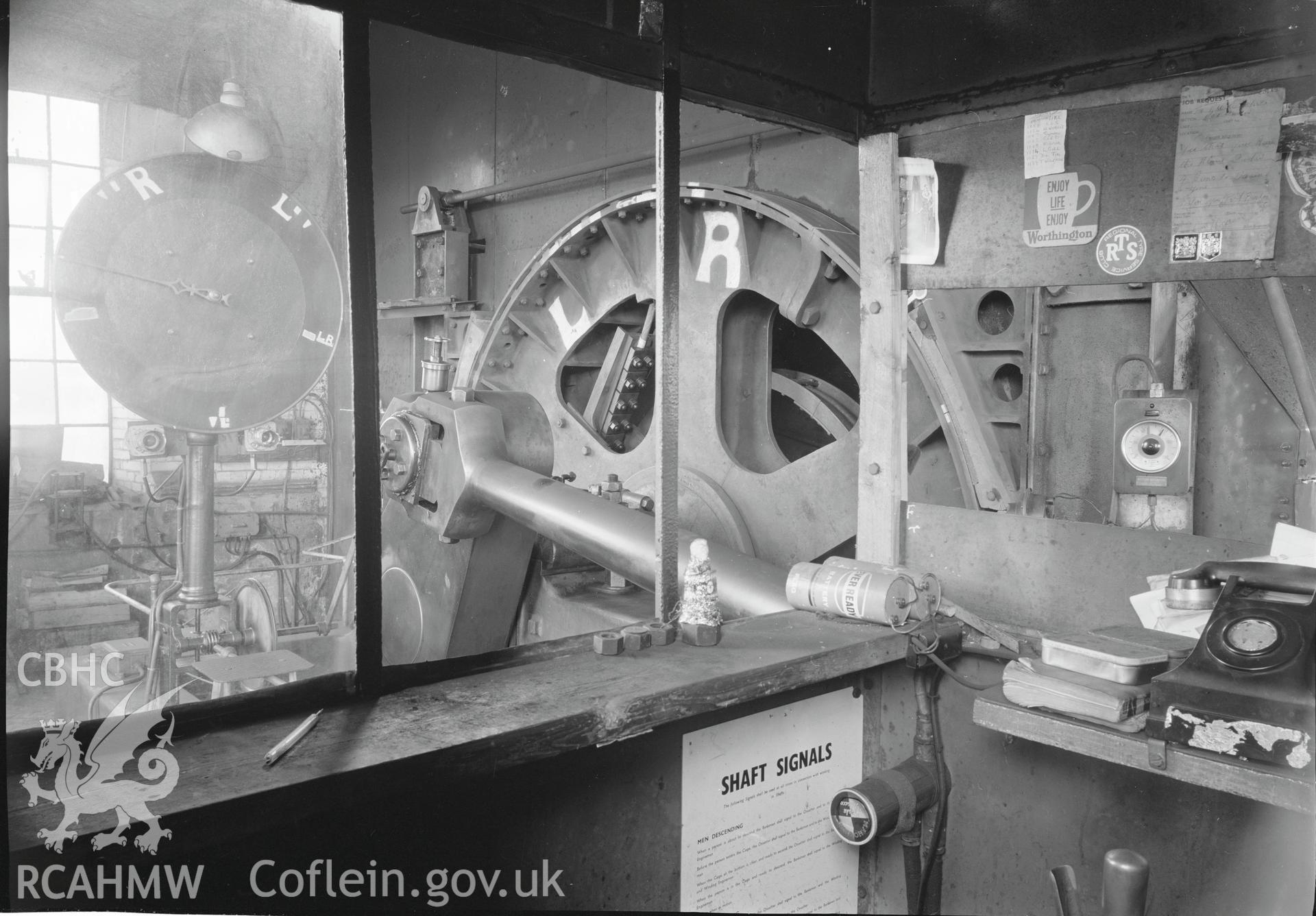 Digital copy of an acetate negative showing steam winder from windingman's cabin at Cefncoed Colliery, from the John Cornwell Collection.
