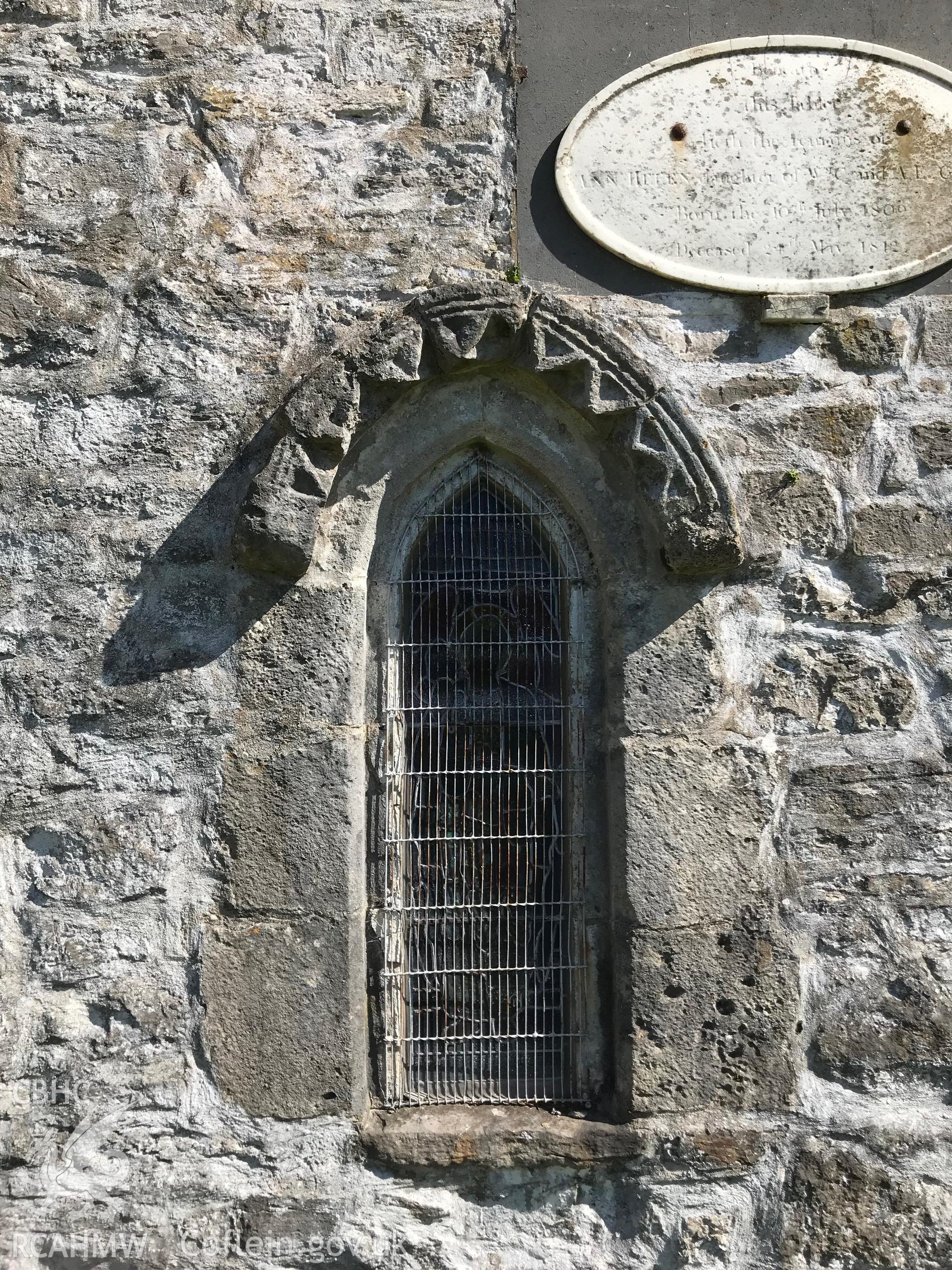 Colour photo showing exterior detail of window at St. Mary's Church, Pennard, taken by Paul R. Davis, 13th May 2018.