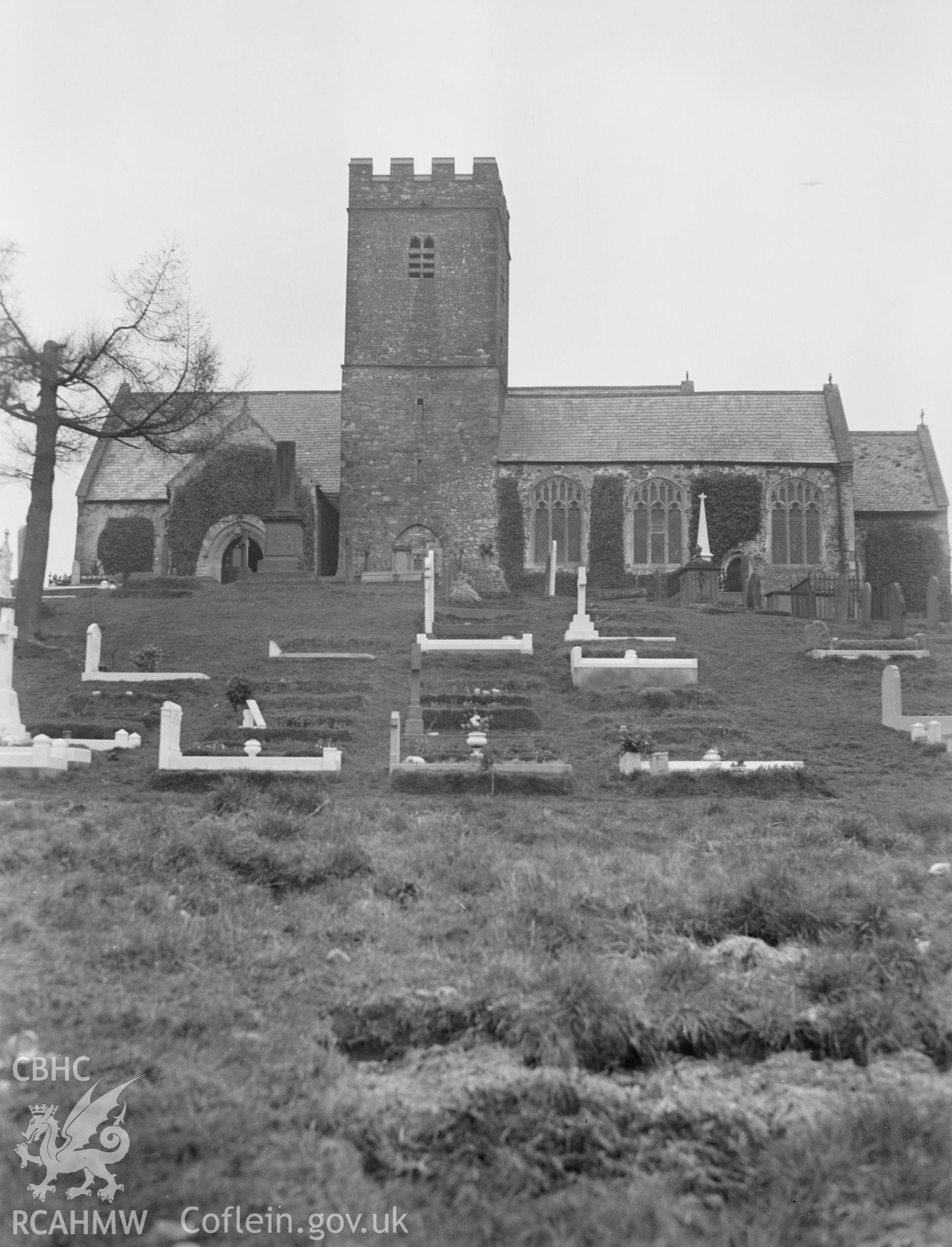 Digital copy of a nitrate negative showing exterior view of St Mellon's Church and churchyard. From the National Building Record Postcard Collection.