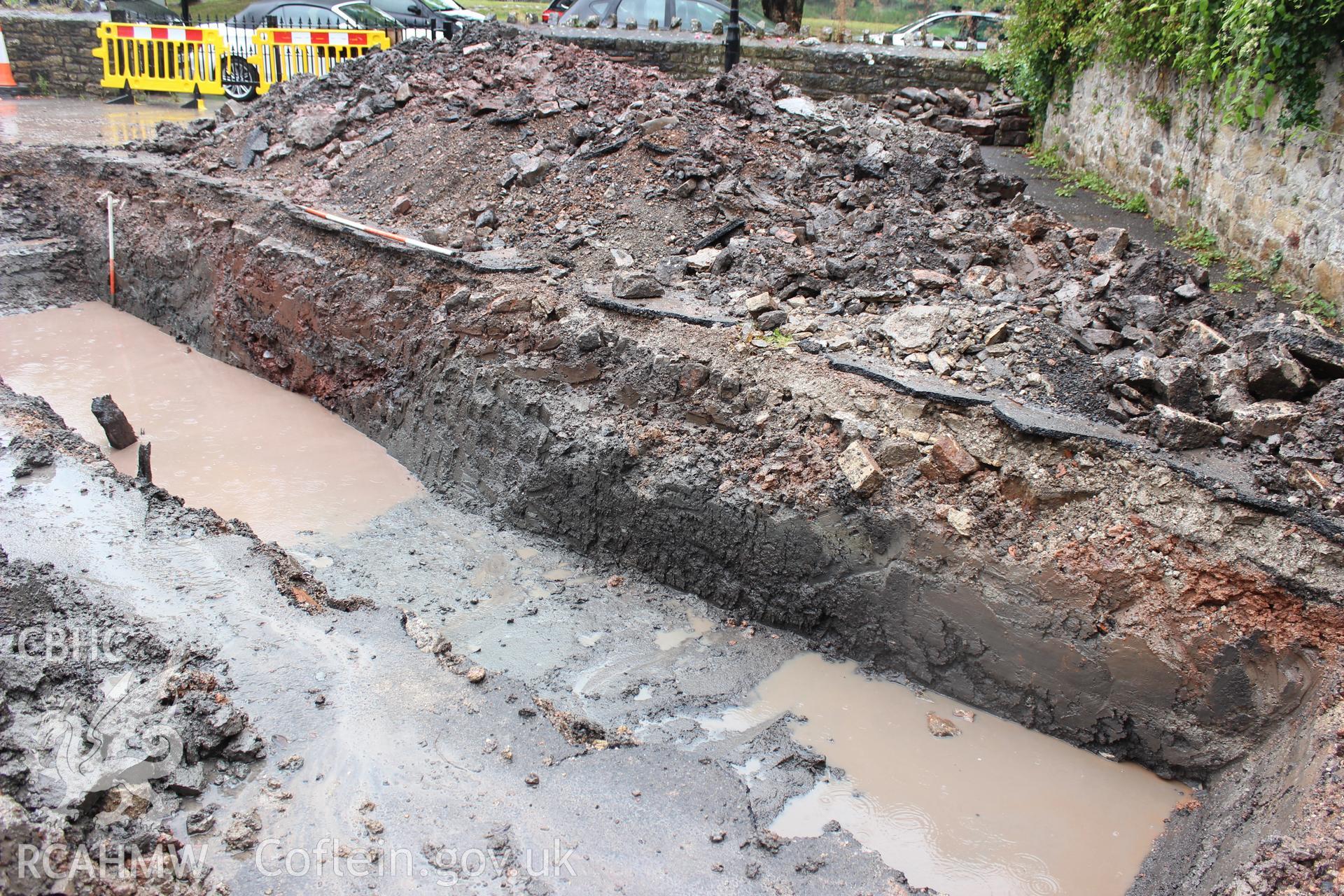 Shot of trench section. Photographed as part of an Archaeological Evaluation of The Bridge Inn, Chepstow, carried out by Archaeology Wales, 2015.