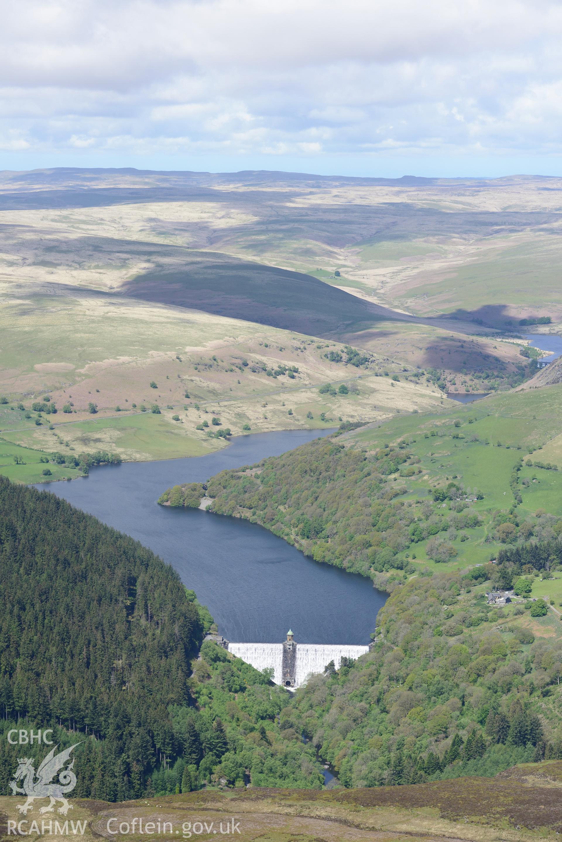 Pen-y-Garreg reservoir, dam and valve tower. Oblique aerial photograph taken during the Royal Commission's programme of archaeological aerial reconnaissance by Toby Driver on 3rd June 2015.