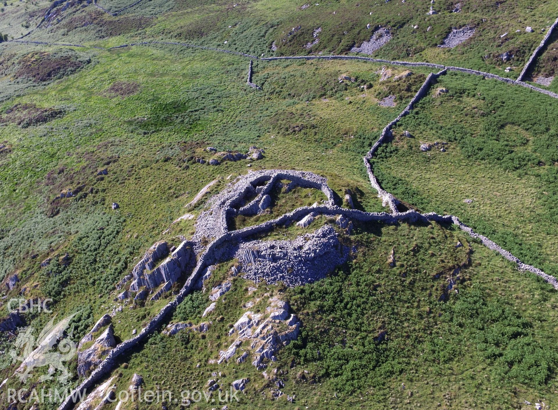 Aerial view of the remains of Castell Caerau, Dolbenmaen. Colour photograph taken by Paul R. Davis on 22nd June 2018.