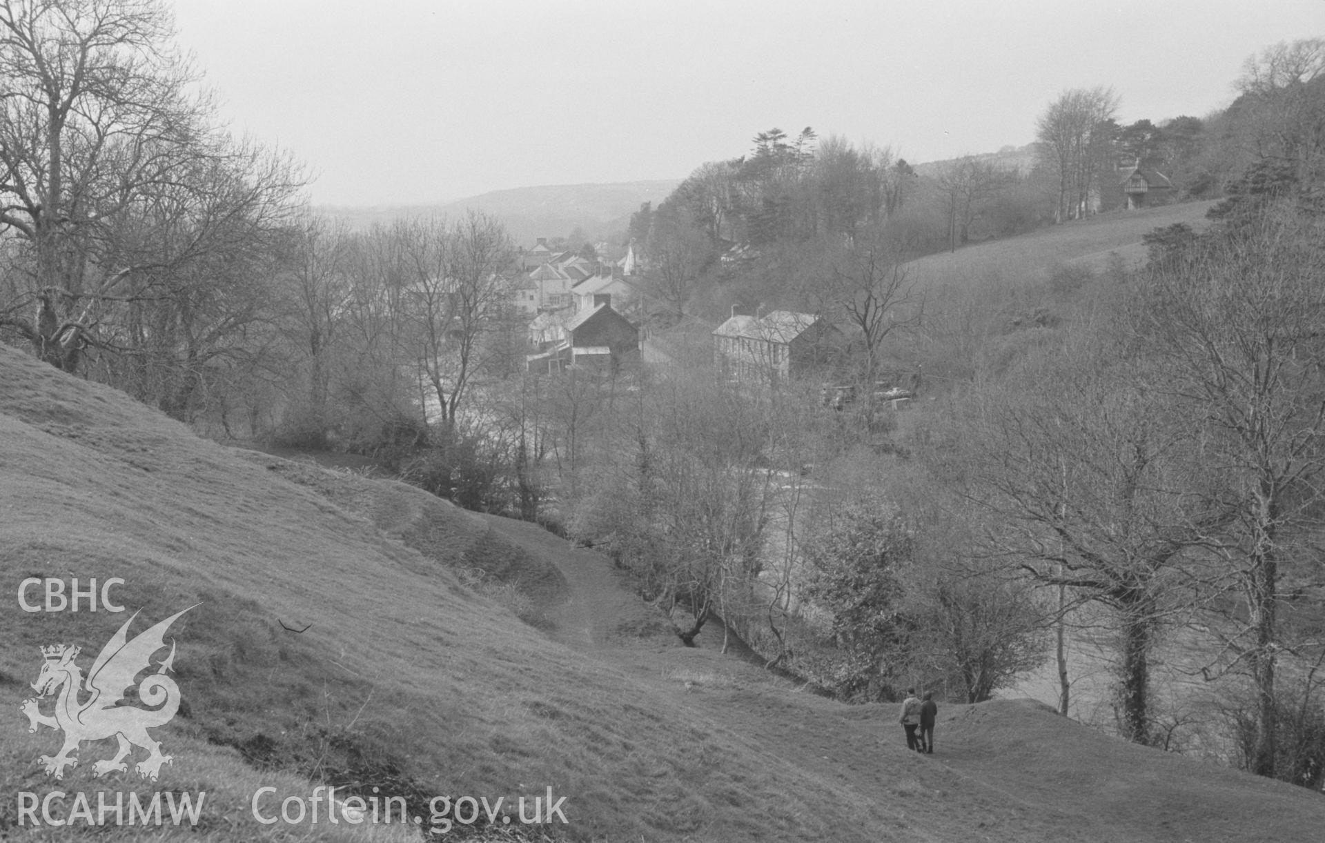 Digital copy of a black and white negative showing view looking up from the castle earthworks across the Teifi with Adpar, Newcastle Emlyn, on the right. Photographed by Arthur O. Chater in April 1966 looking north west from Grid Reference SN 312 407.