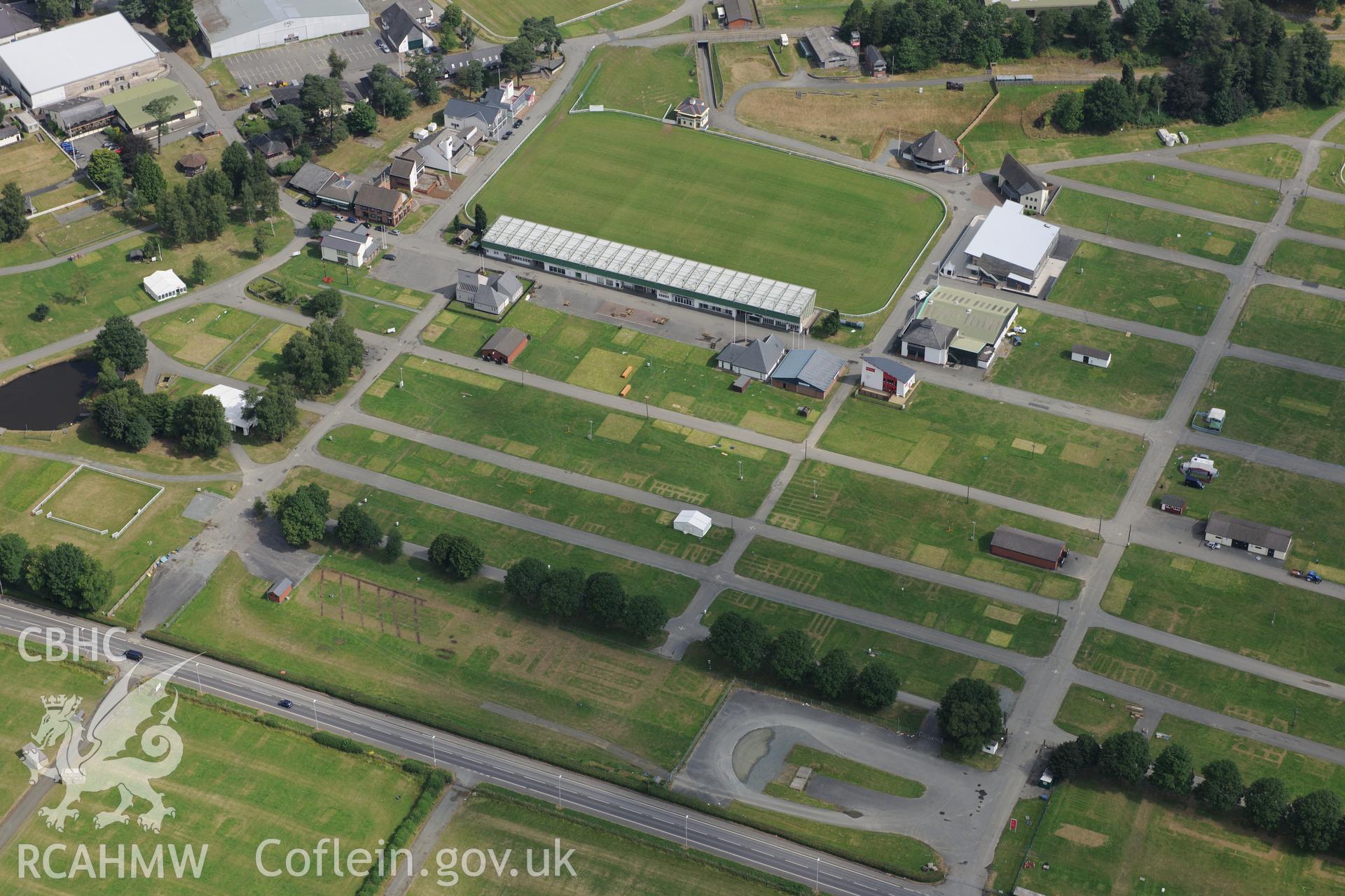 The Royal Welsh Showground, Llanelwedd. Oblique aerial photograph taken during the Royal Commission?s programme of archaeological aerial reconnaissance by Toby Driver on 1st August 2013.