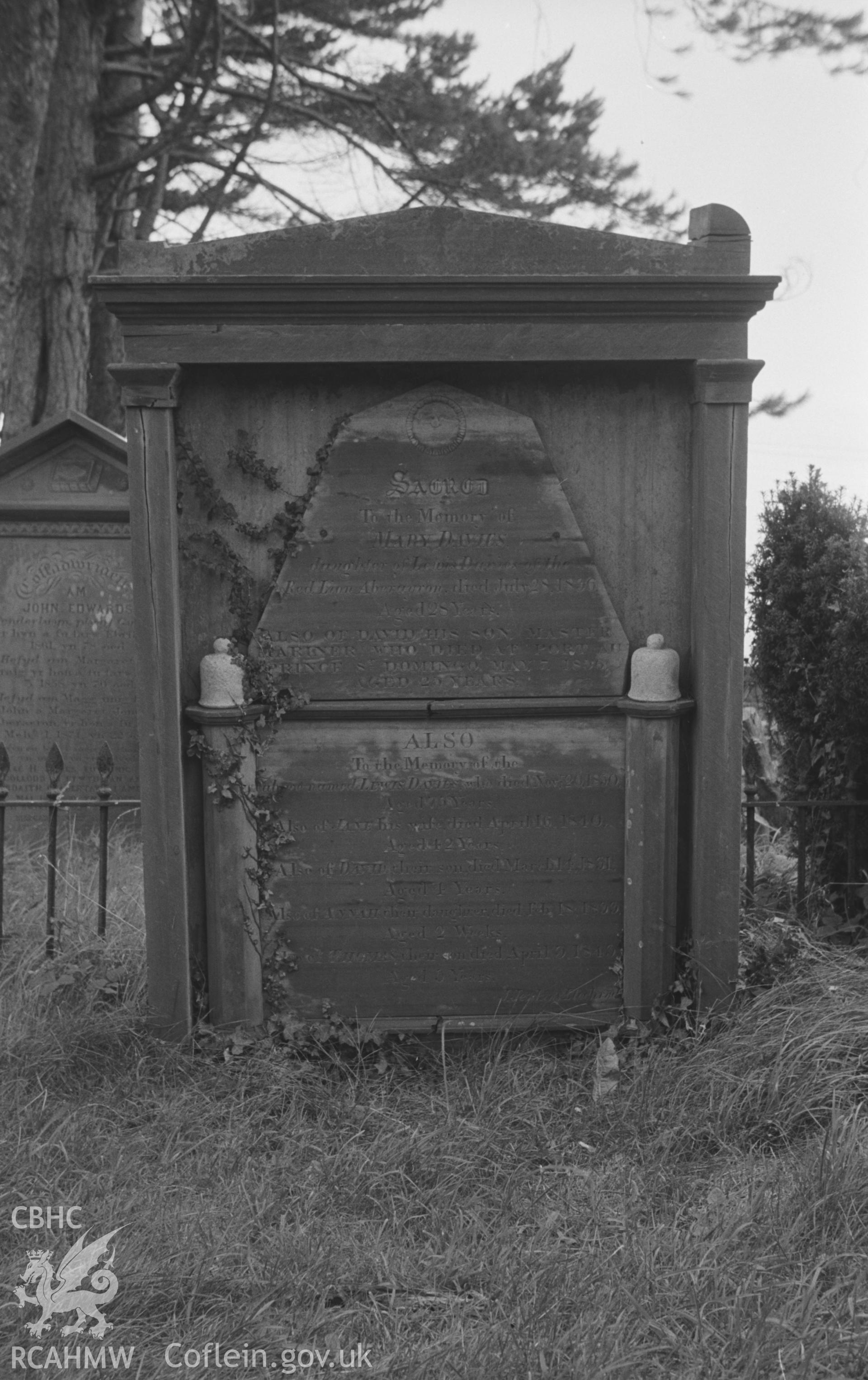 Digital copy of a black and white negative showing gravestones at St. David's Church, Henfynyw, Aberaeron. Photographed by Arthur O. Chater on 5th September 1966 from Grid Reference SN 447 613.
