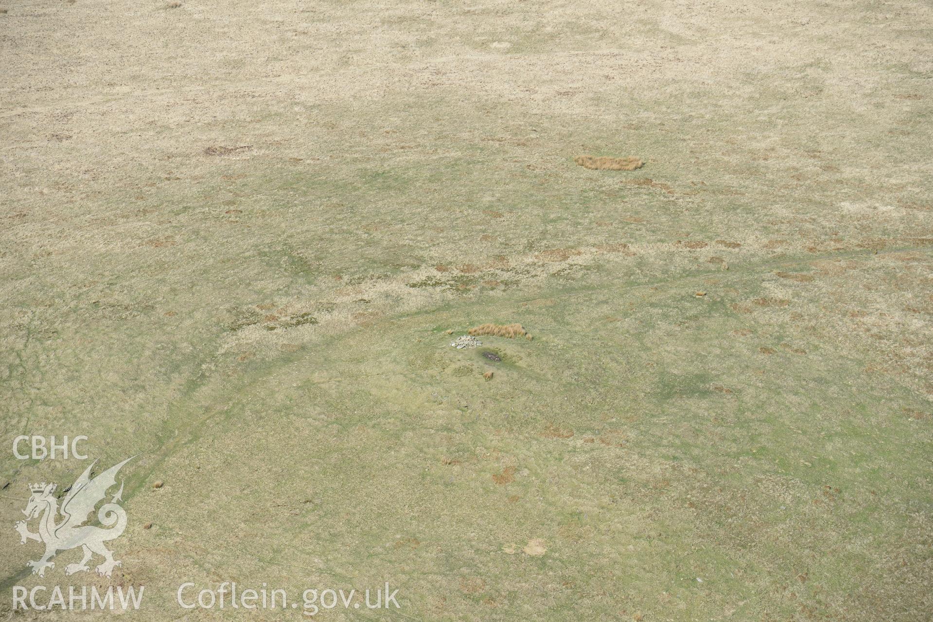 Foel Feddau, Cairn. Oblique aerial photograph taken during the Royal Commission's programme of archaeological aerial reconnaissance by Toby Driver on 15th April 2015.