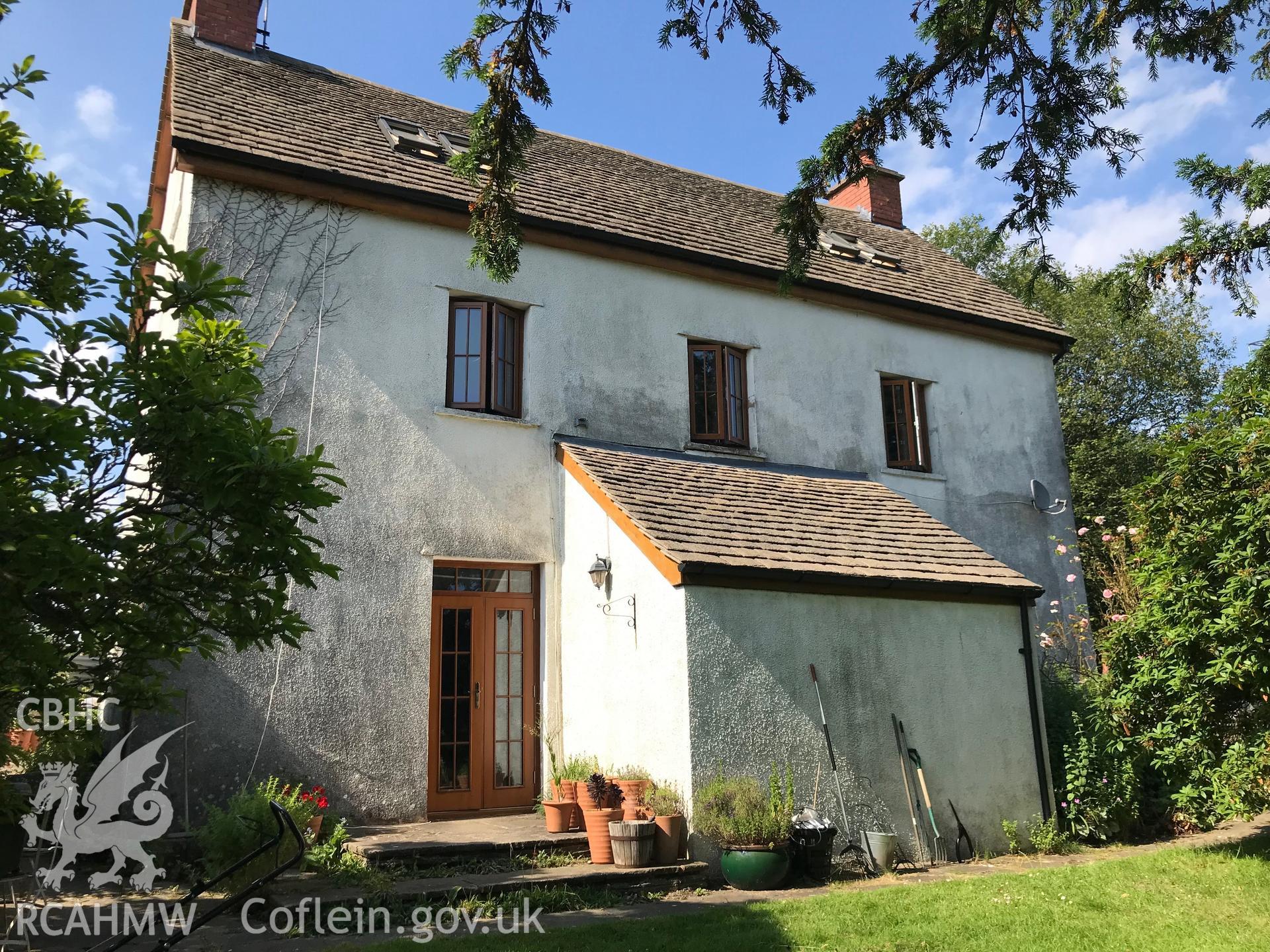 Digital colour photograph showing exterior view of Ty-Isaf Farmhouse, north of Bedwas, taken by Paul R. Davis on 15th July 2019.