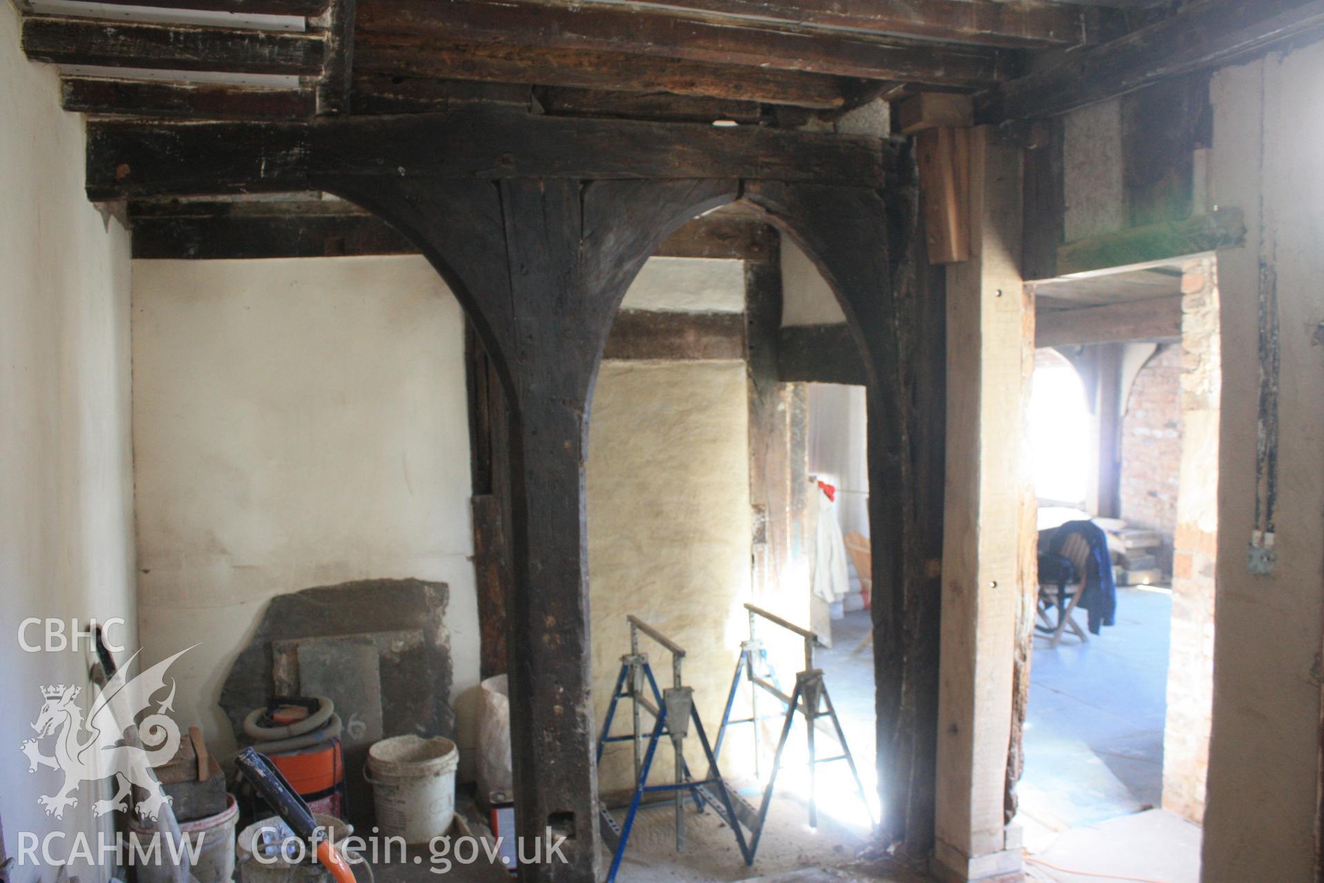 Colour photograph of interior 15th century two centred arched doorway at Porth-y-Dwr, 67 Clwyd Street, Ruthin. Photographed during survey conducted by Geoff Ward on 10th June 2013.
