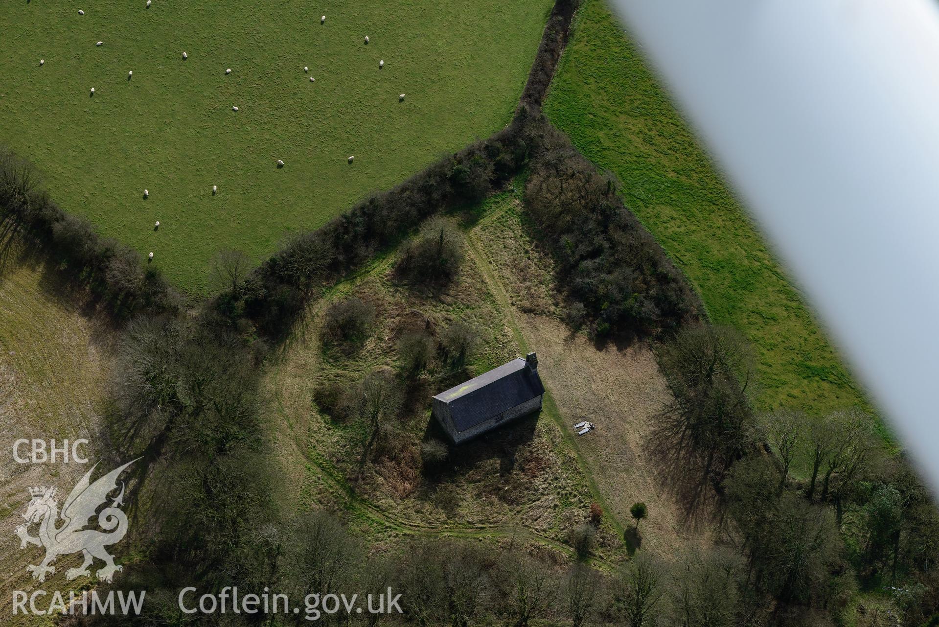 St. Andrew's church, Bayvil, Nevern. Oblique aerial photograph taken during the Royal Commission's programme of archaeological aerial reconnaissance by Toby Driver on 13th March 2015.