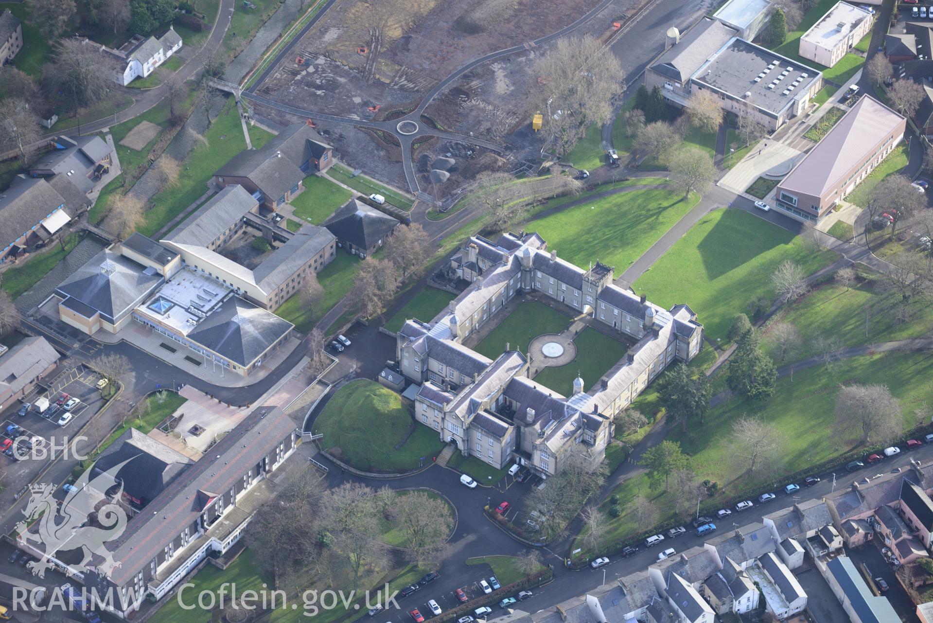 St David's College garden, the Roderic Bowen Library and Archives and Stephen's Castle, Lampeter. Oblique aerial photograph taken during the Royal Commission's programme of archaeological aerial reconnaissance by Toby Driver on 6th January 2015.