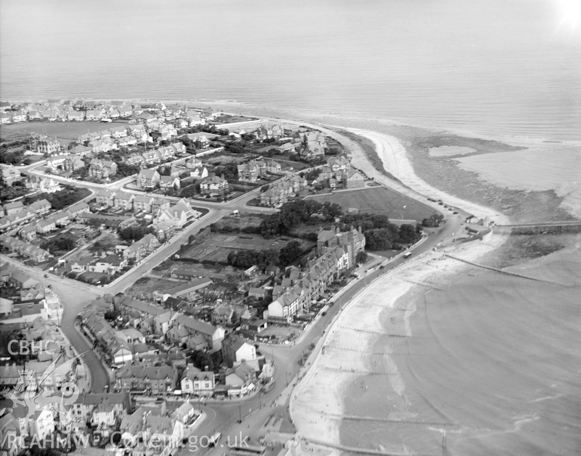 General view of Llandrillo-yn-rhos showing pier, oblique aerial view. 5?x4? black and white glass plate negative.