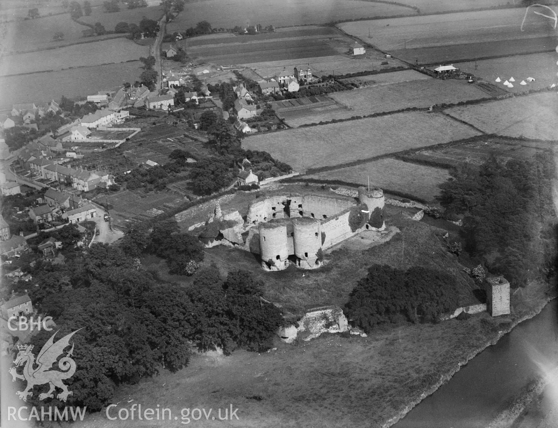 Rhuddlan with Castle in foreground, oblique aerial view. 5?x4? black and white glass plate negative.