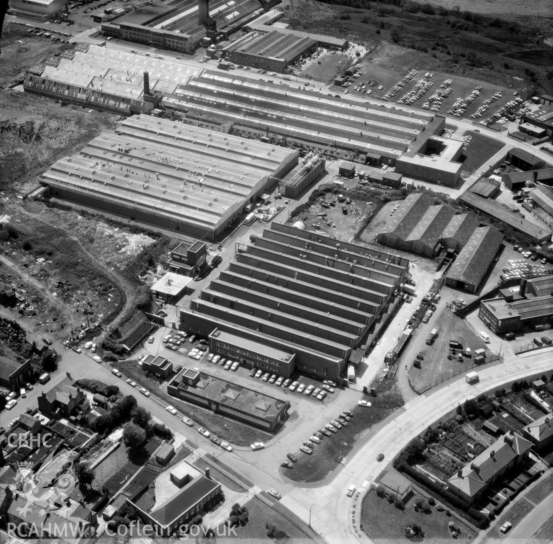 Black and white oblique aerial photograph showing the Mettoy Factory, Fforest Fach Industrial Estate, from Aerofilms album no. W.30, taken by Aerofilms Ltd. and dated 22/6/1972.