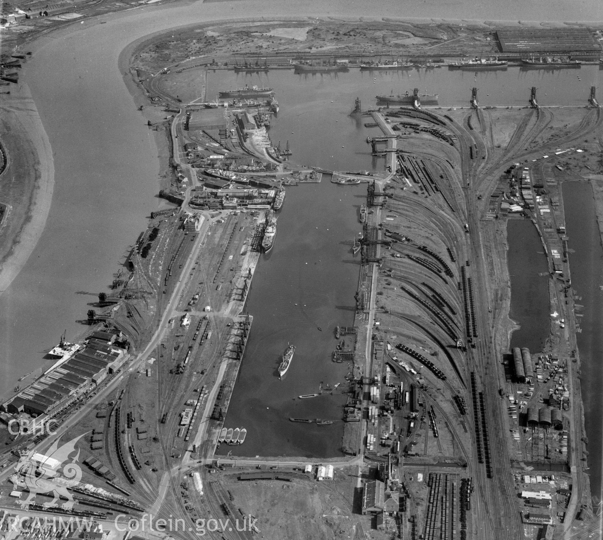 Black and white oblique aerial photograph showing Newport Docks, from Aerofilms album Monmouthshire N-Pe, taken by Aerofilms Ltd and dated 1947.