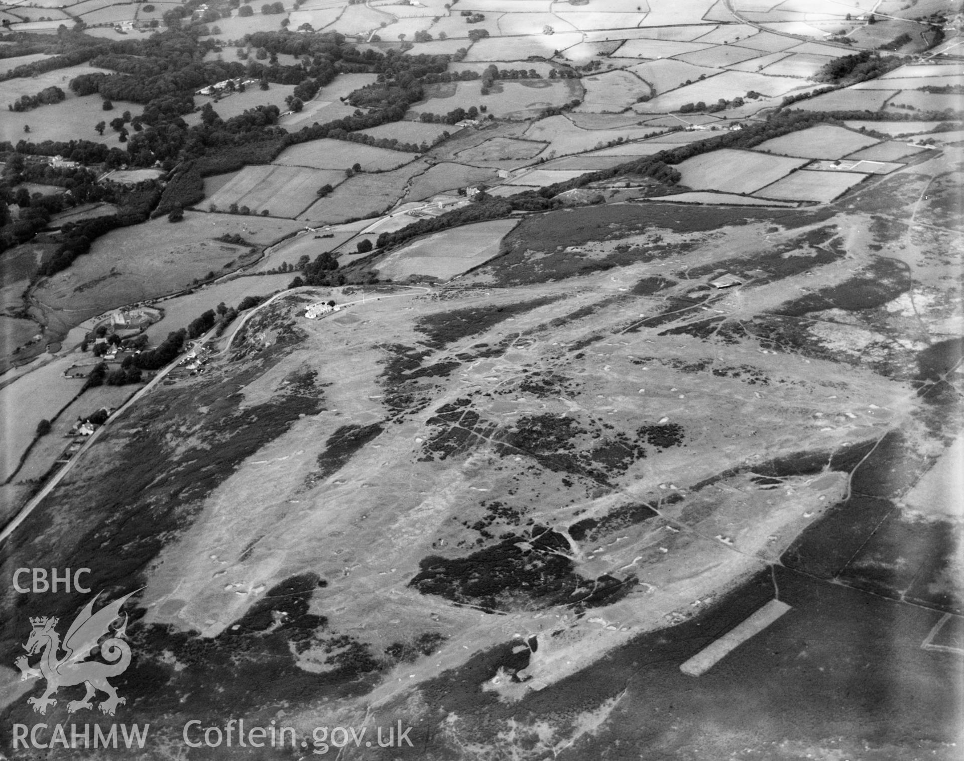 View of Ogmore-by-Sea, showing Southerndown golf course, oblique aerial view. 5?x4? black and white glass plate negative.