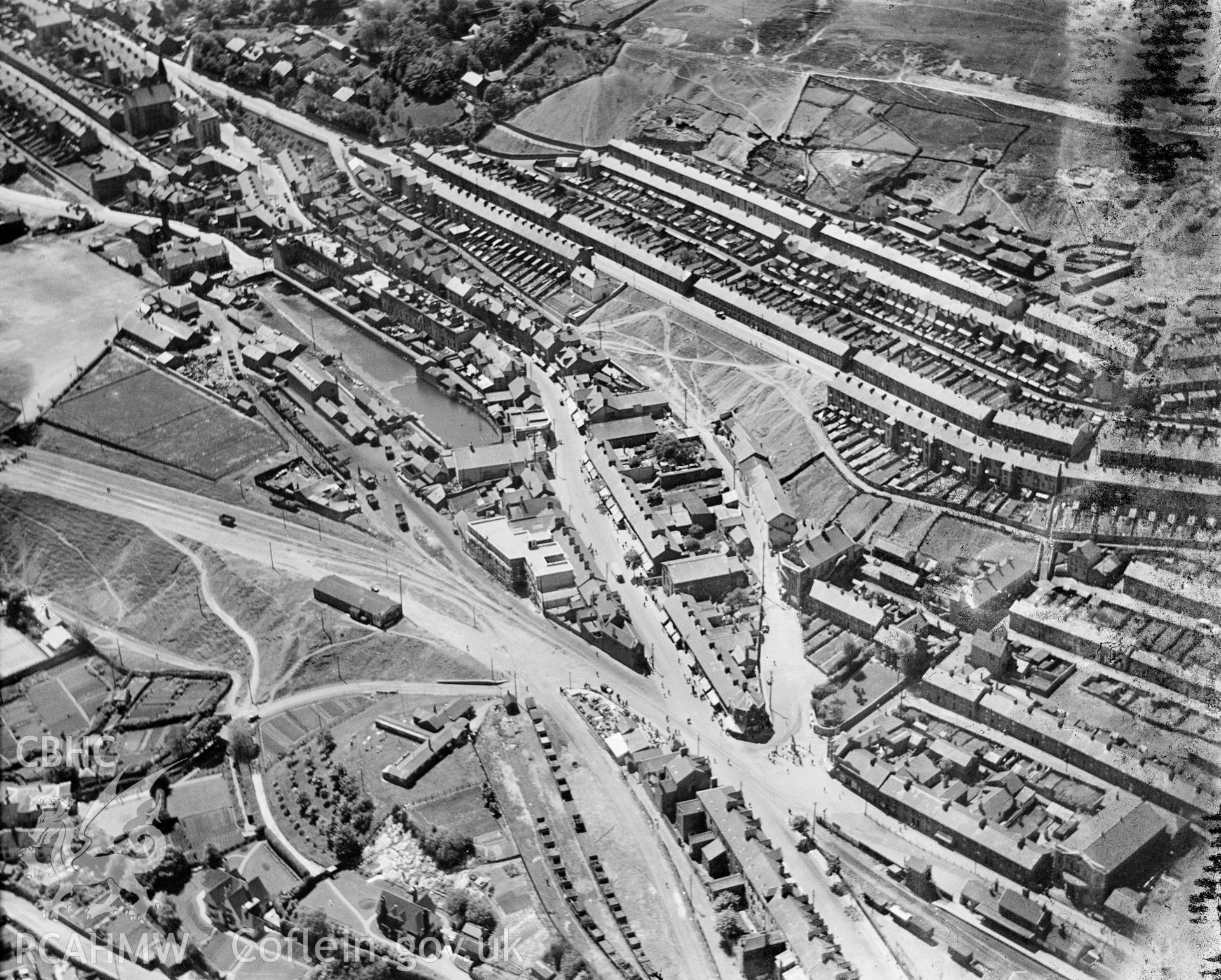 View of Ebbw Vale, showing Workmans Hall, Boer War memorial, and streets, oblique aerial view. 5?x4? black and white glass plate negative.