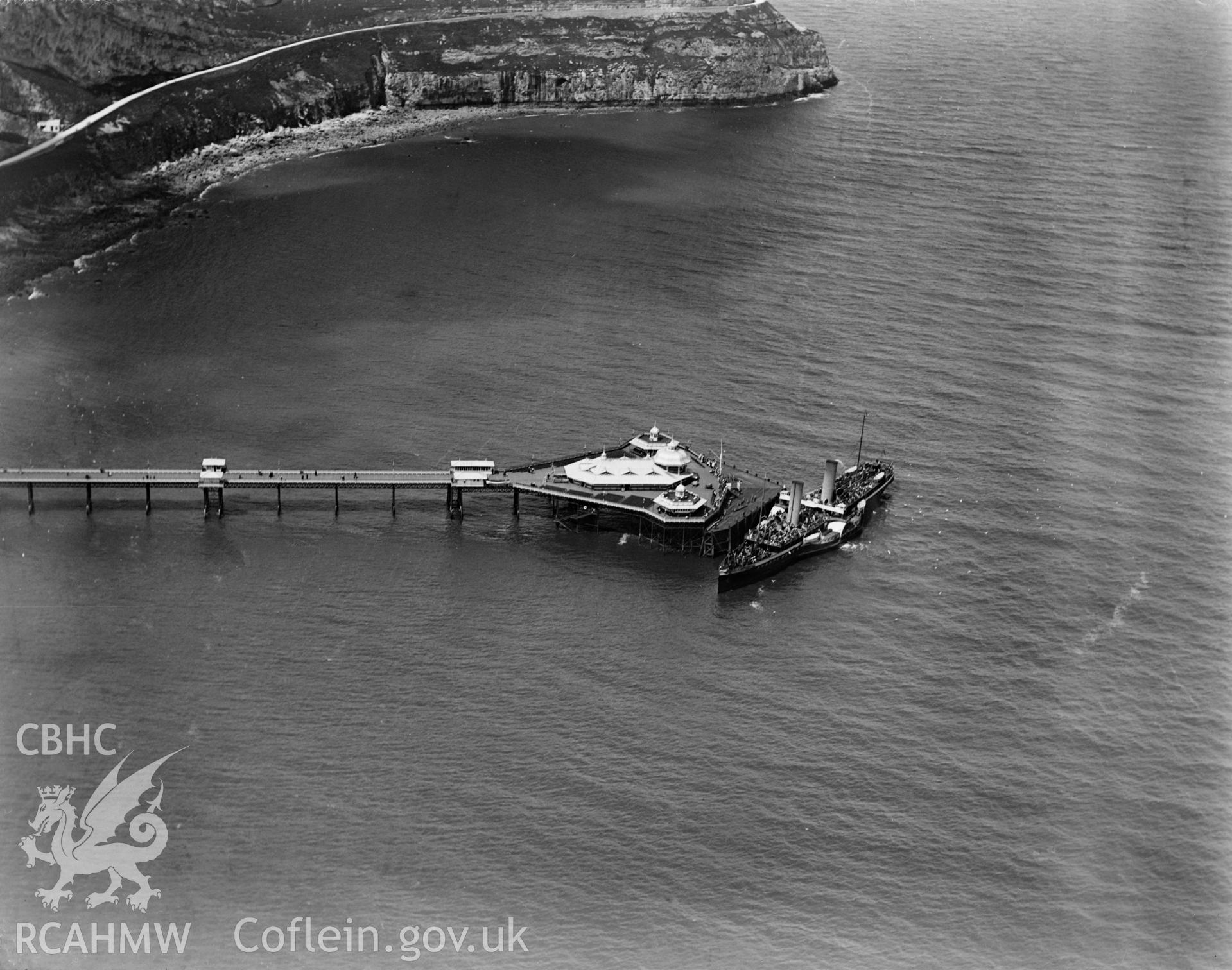 View of Llandudno showing pier and steam paddle ship, oblique aerial view. 5?x4? black and white glass plate negative.