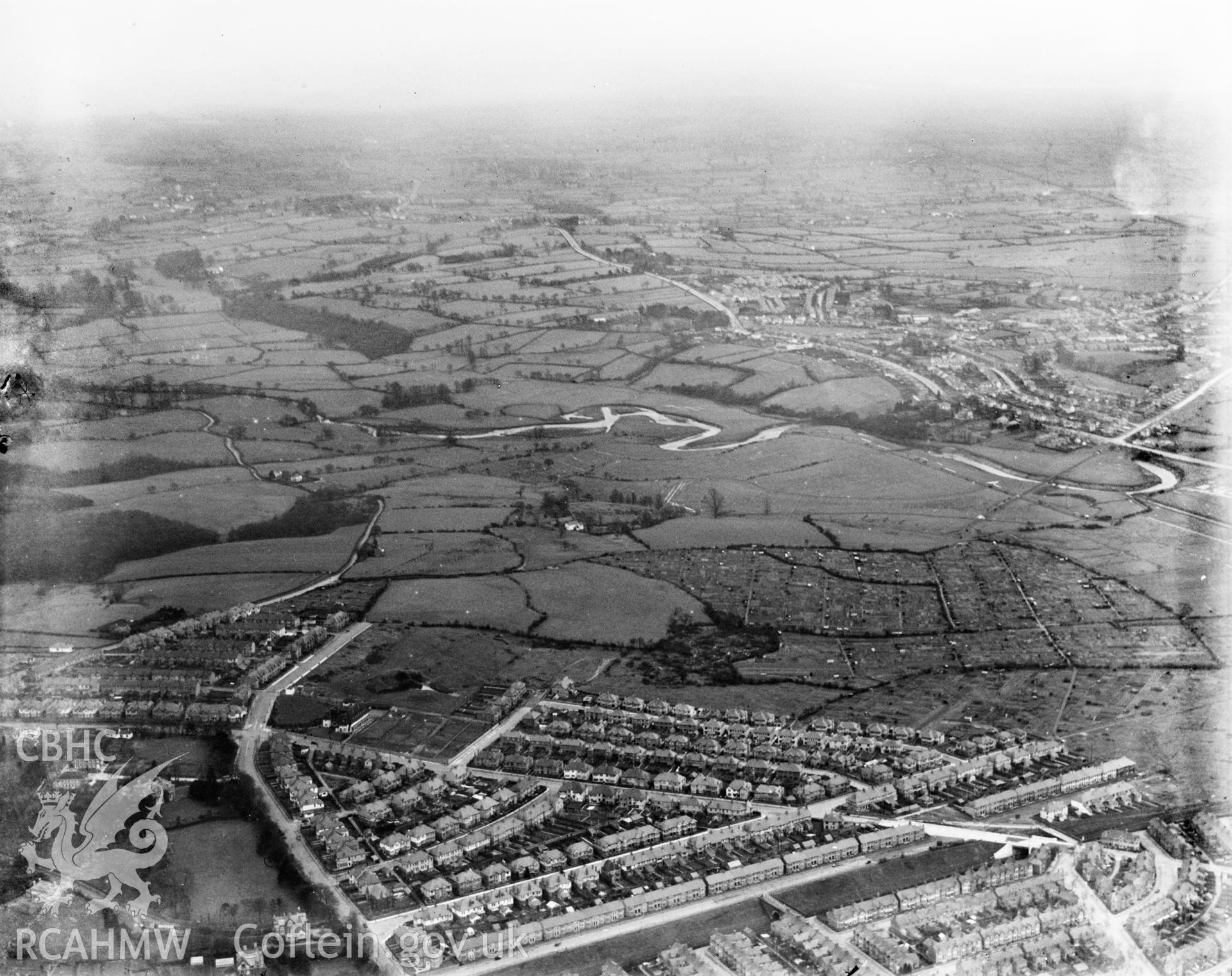View of Cardiff showing the area near Rumney and Pengam Moor and allotment gardens, oblique aerial view. 5?x4? black and white glass plate negative.