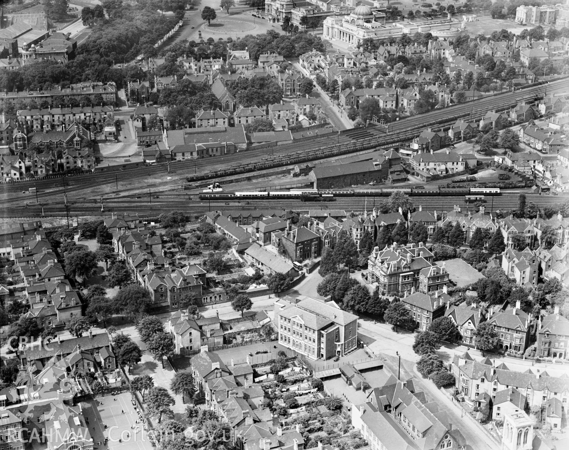 View of central Cardiff, showing Heathfield House catholic school, Mansion House and the Prince of Wales hospital, oblique aerial view. 5?x4? black and white glass plate negative.