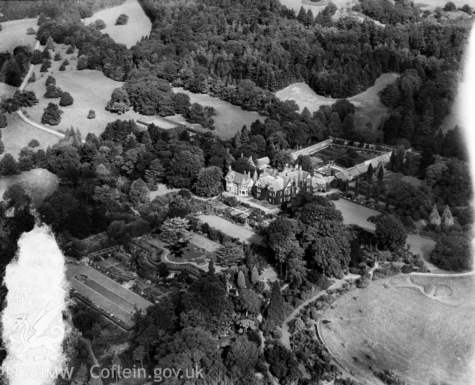View of Bodnant House and gardens, oblique aerial view. 5?x4? black and white glass plate negative.