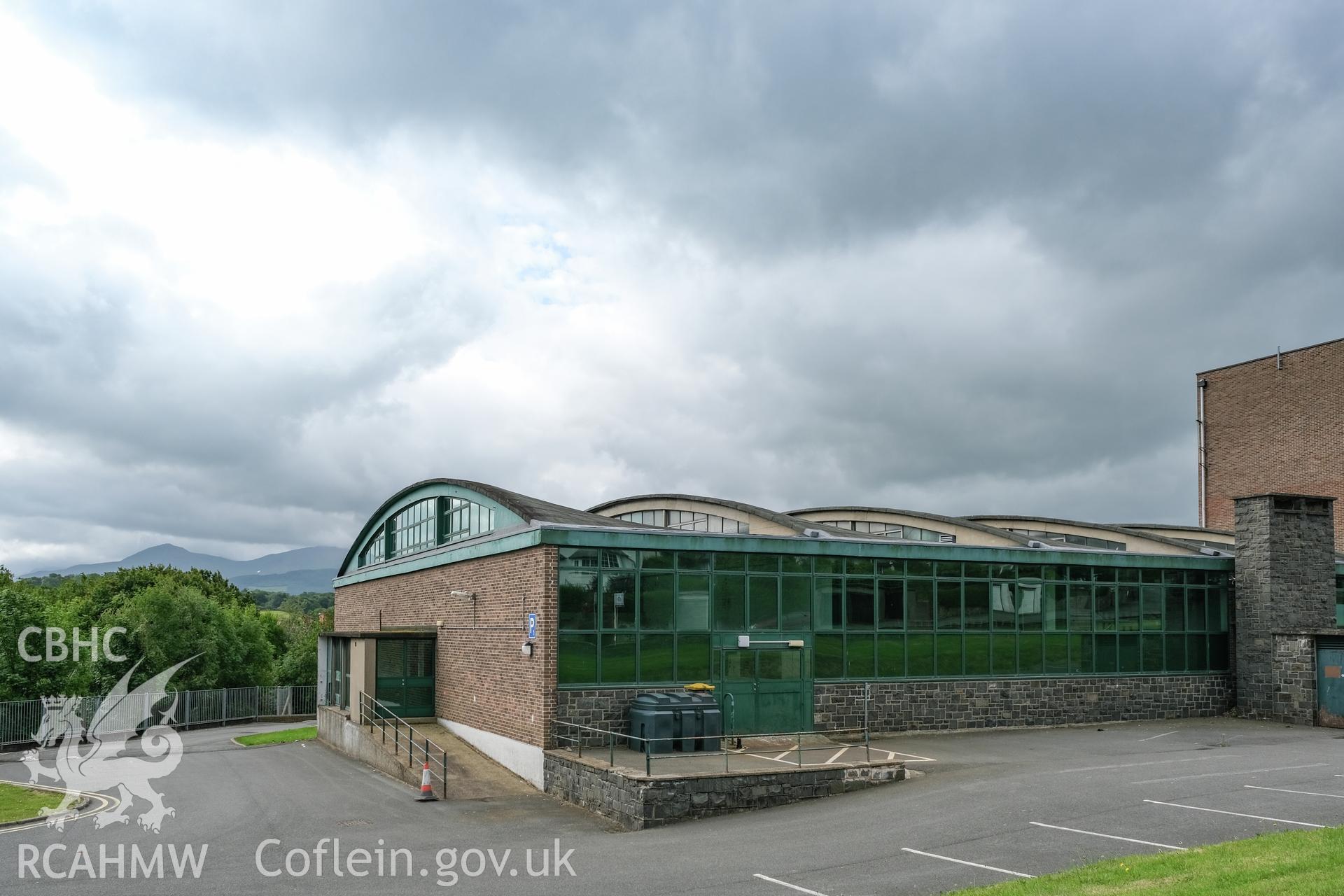 Digital colour photograph showing exterior view from road of Caernarfonshire Technical College, Ffriddoedd Road, Bangor. Photographed by Dilys Morgan and donated by Wyn Thomas of Grwp Llandrillo-Menai Further Education College, 2019.