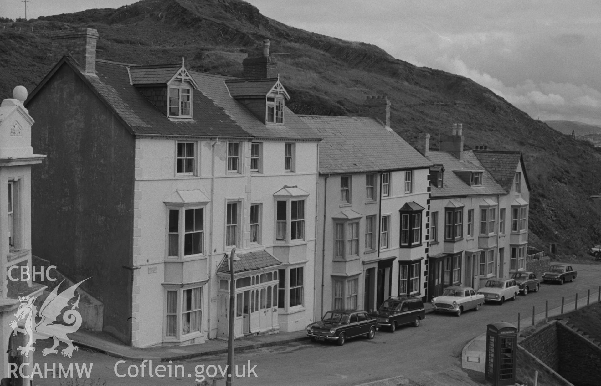 Digital copy of a black and white negative showing Sir Henry Walford Davies' house at the corner of Queen's Road and Cliff Terrace, Aberystwyth. Photographed by Arthur O. Chater on 15th August 1967 looking east from Grid Reference SN 584 825.