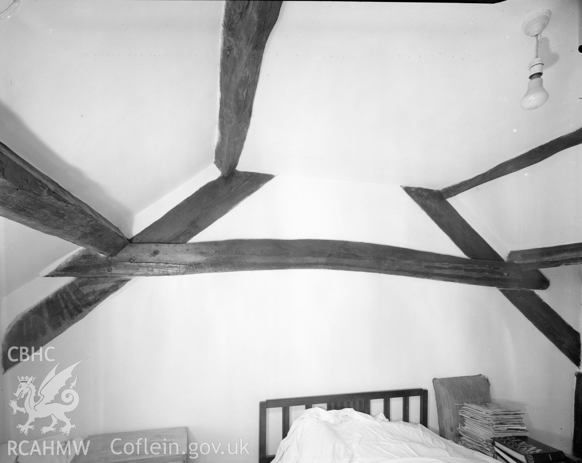 Digital copy of an acetate negative showing roof beams at Hywel Ddu, Merioneth.