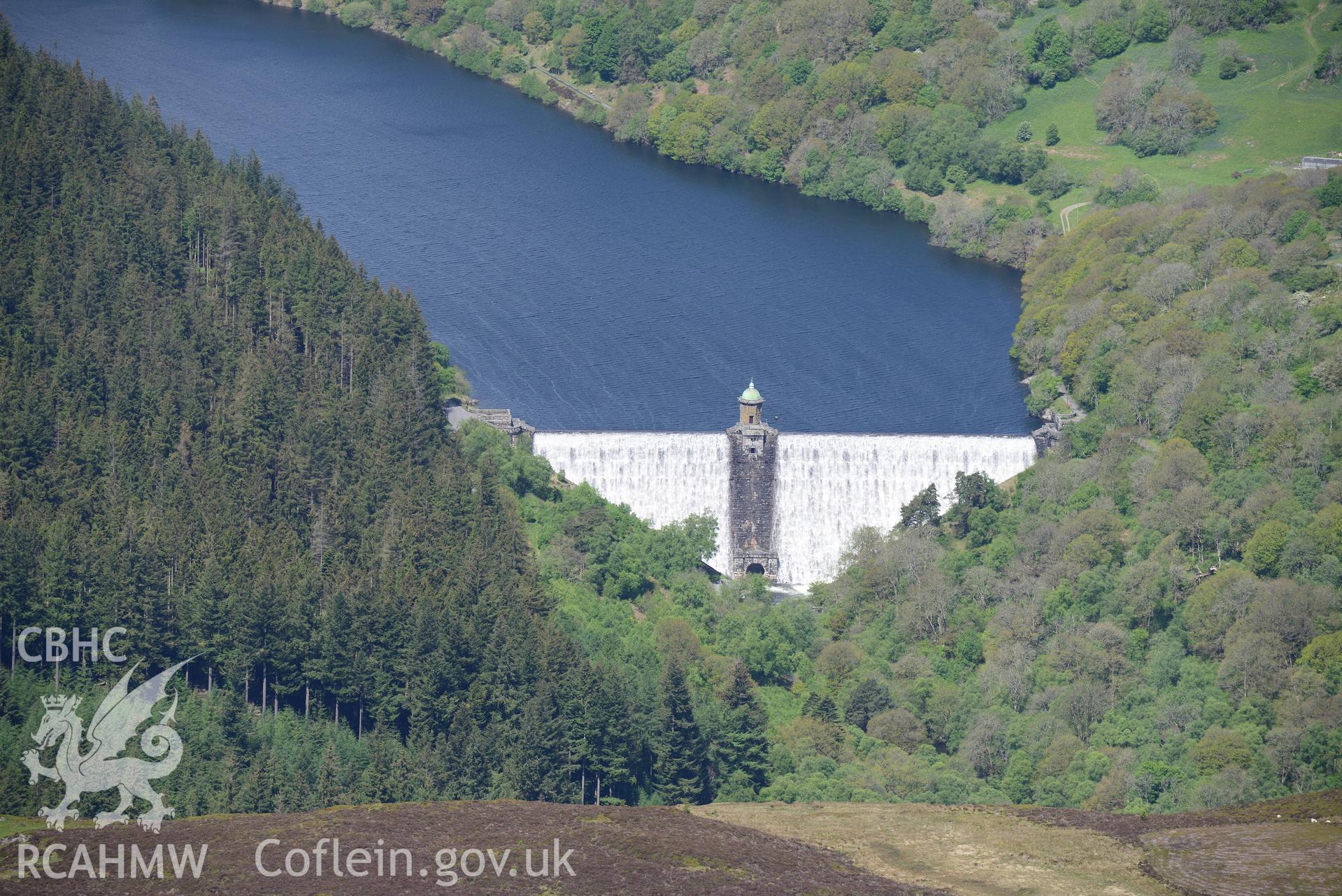 Pen-y-Garreg reservoir, dam and valve tower. Oblique aerial photograph taken during the Royal Commission's programme of archaeological aerial reconnaissance by Toby Driver on 3rd June 2015.