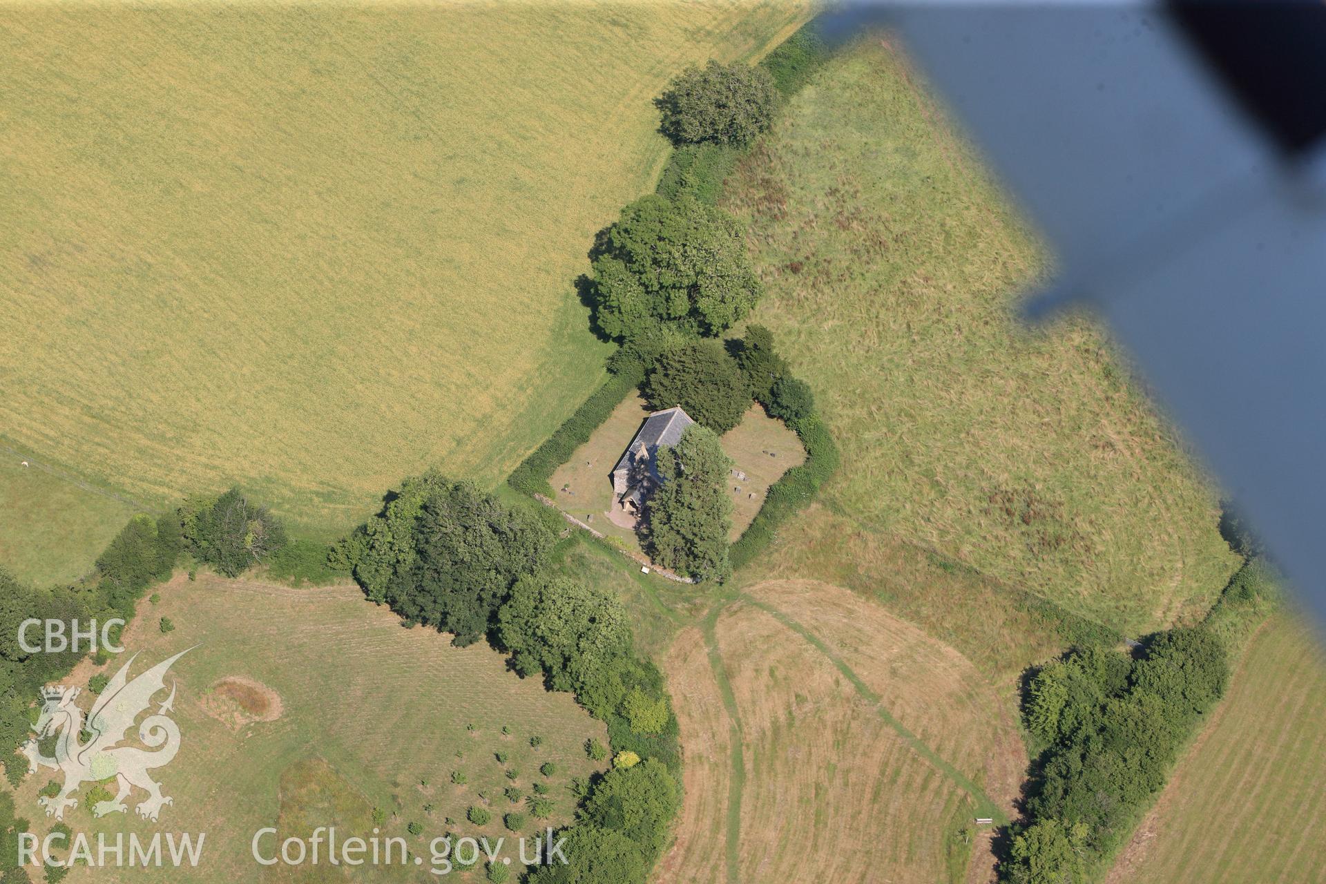 St. Mary's church and settlement earthworks at Penterry, north of Chepstow. Oblique aerial photograph taken during the Royal Commission?s programme of archaeological aerial reconnaissance by Toby Driver on 1st August 2013.