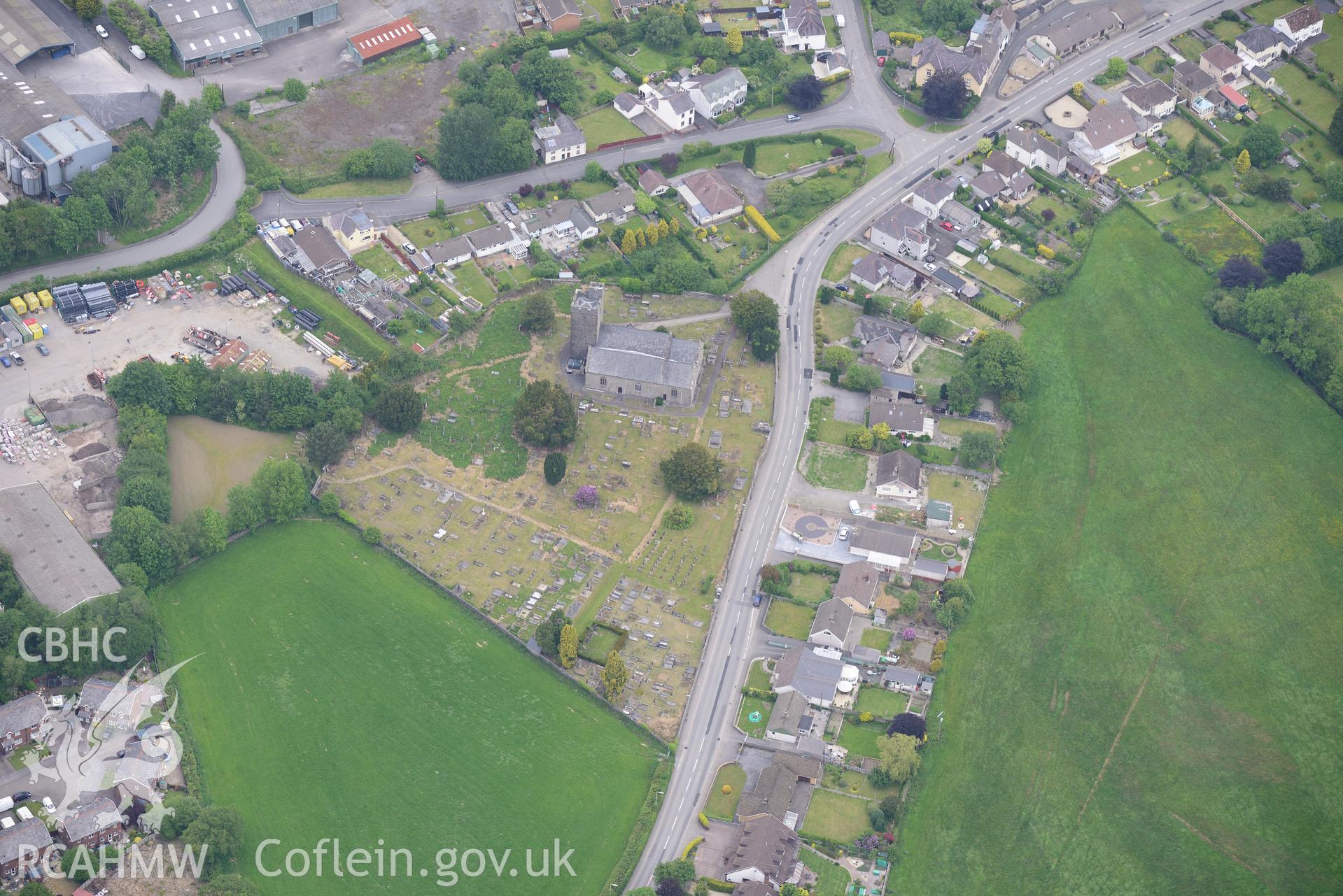 St. Dingat's Church and Llandovery town. Oblique aerial photograph taken during the Royal Commission's programme of archaeological aerial reconnaissance by Toby Driver on 11th June 2015.