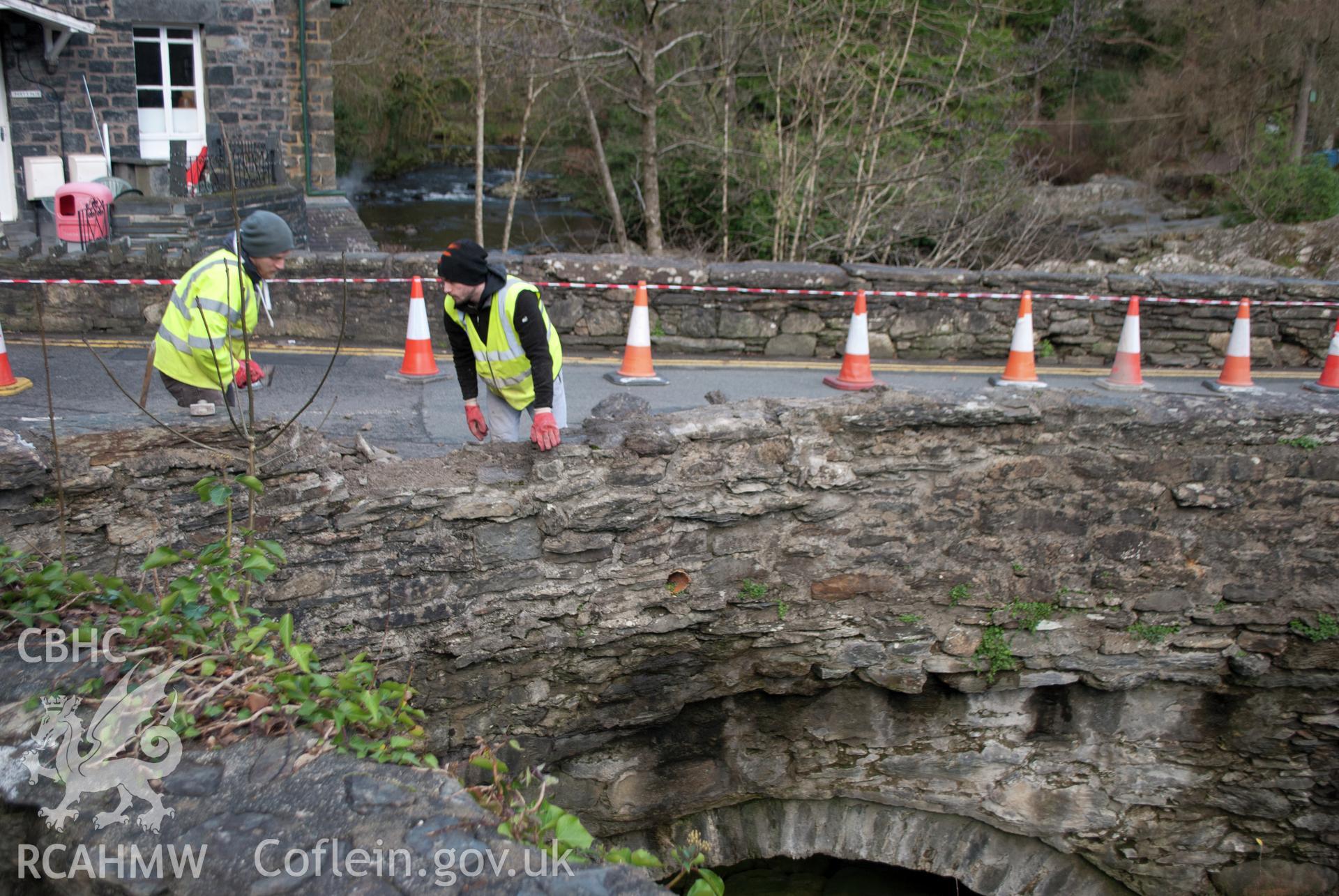 View of parapet wall demolition viewed from the south east. Digital photograph taken for Archaeological Watching Brief at Pont y Pair, Betws y Coed, 2019. Gwynedd Archaeological Trust Project no. G2587.