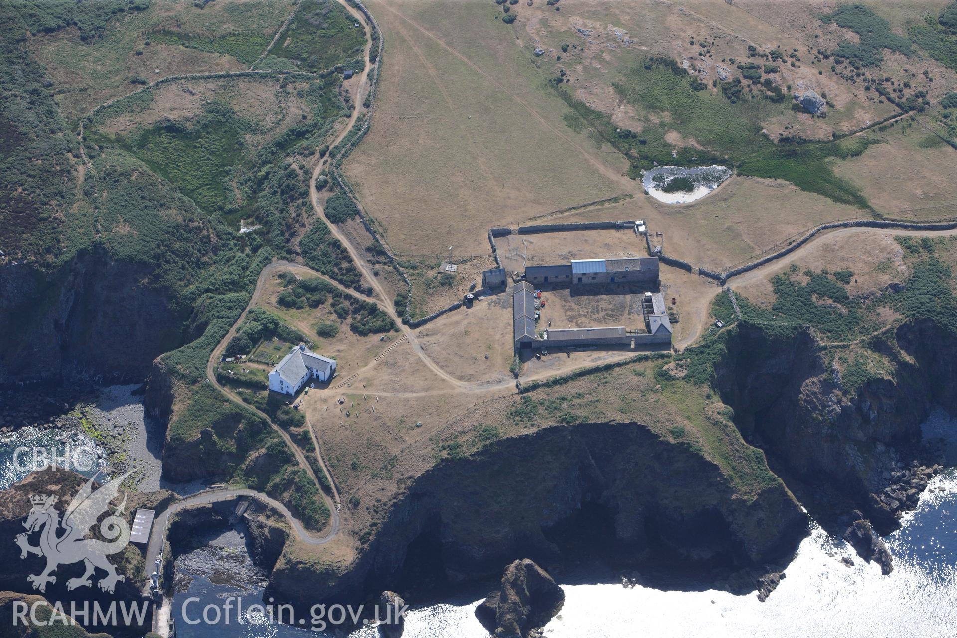 Ramsey Island Farm and pond, on Ramsey Island. Oblique aerial photograph taken during the Royal Commission?s programme of archaeological aerial reconnaissance by Toby Driver on 16th July 2013.